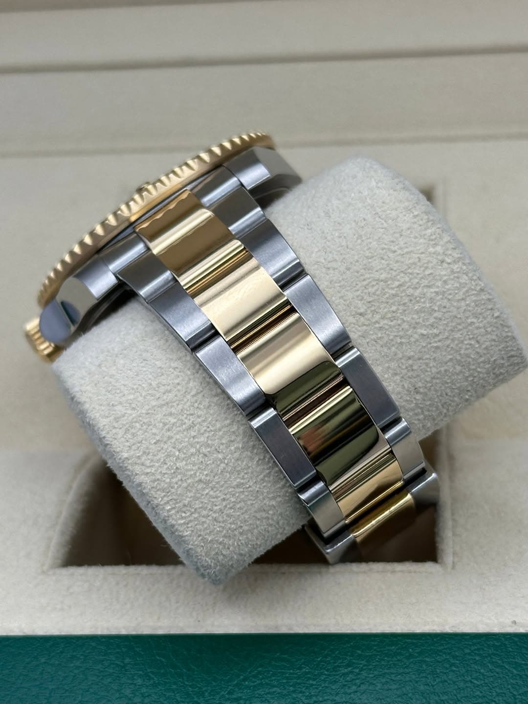 May be an image of jewelry, wrist watch, bangle and text
