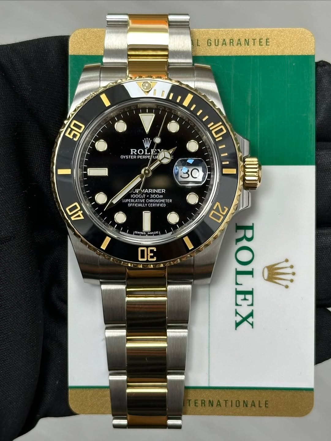 May be an image of wrist watch and text that says 'GUARANTEE 50 ROLE ROI OYS Y OYSTERPER PERPE ROLEY บศ 10 30 UF UFMARINER 1000/ UOCOLATU 0O 1000ft=30 Omer UPERLATIV PERLATIVE…