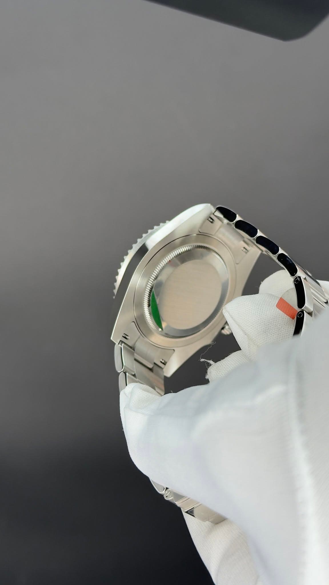 May be an image of wrist watch and rearview mirror