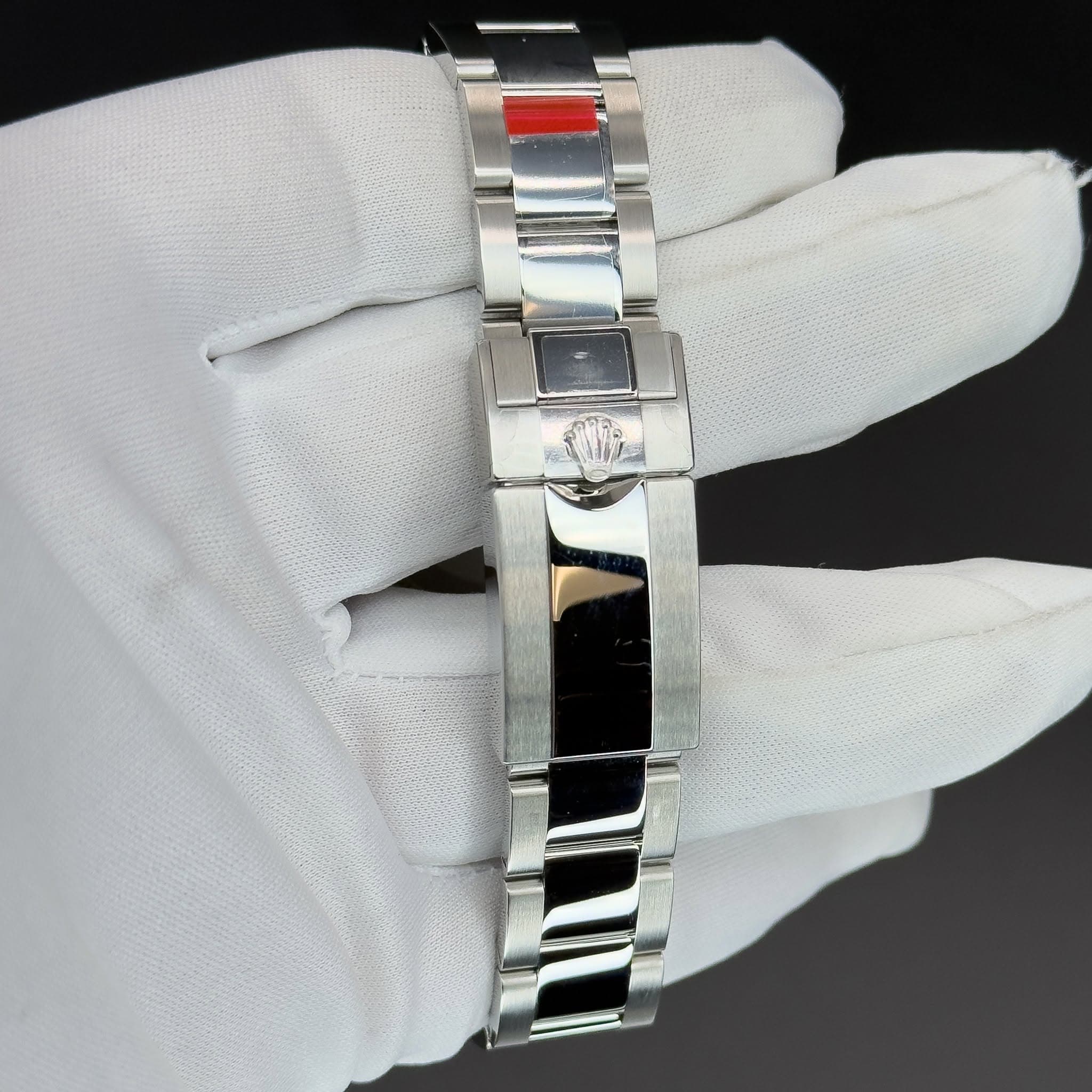 May be an image of wrist watch and jewelry