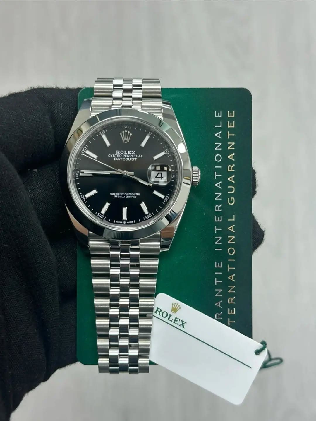 May be an image of wrist watch and text that says '55 50 ROLEX OYS yBTE DAT DATEJUST EJUST UAL 0 45 de s 4 5 40 PERLATMEORINDANTER SE 3 se 2 25 Bess N 참 UU INTERNATIONALE GUARANTEE…
