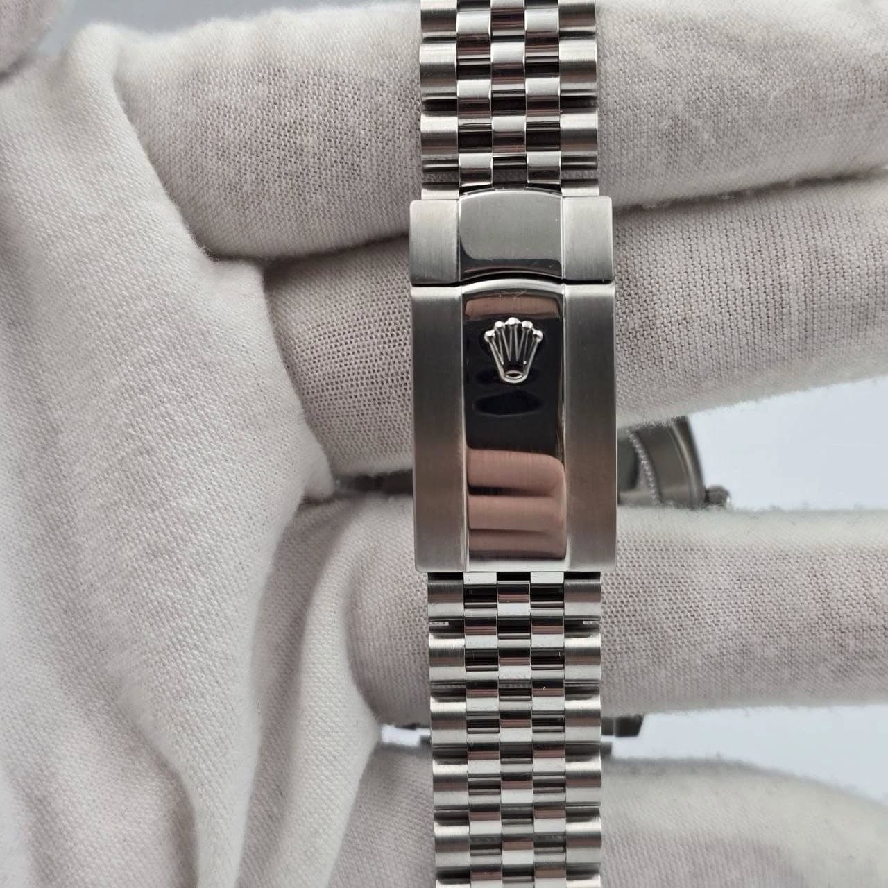 May be an image of wrist watch