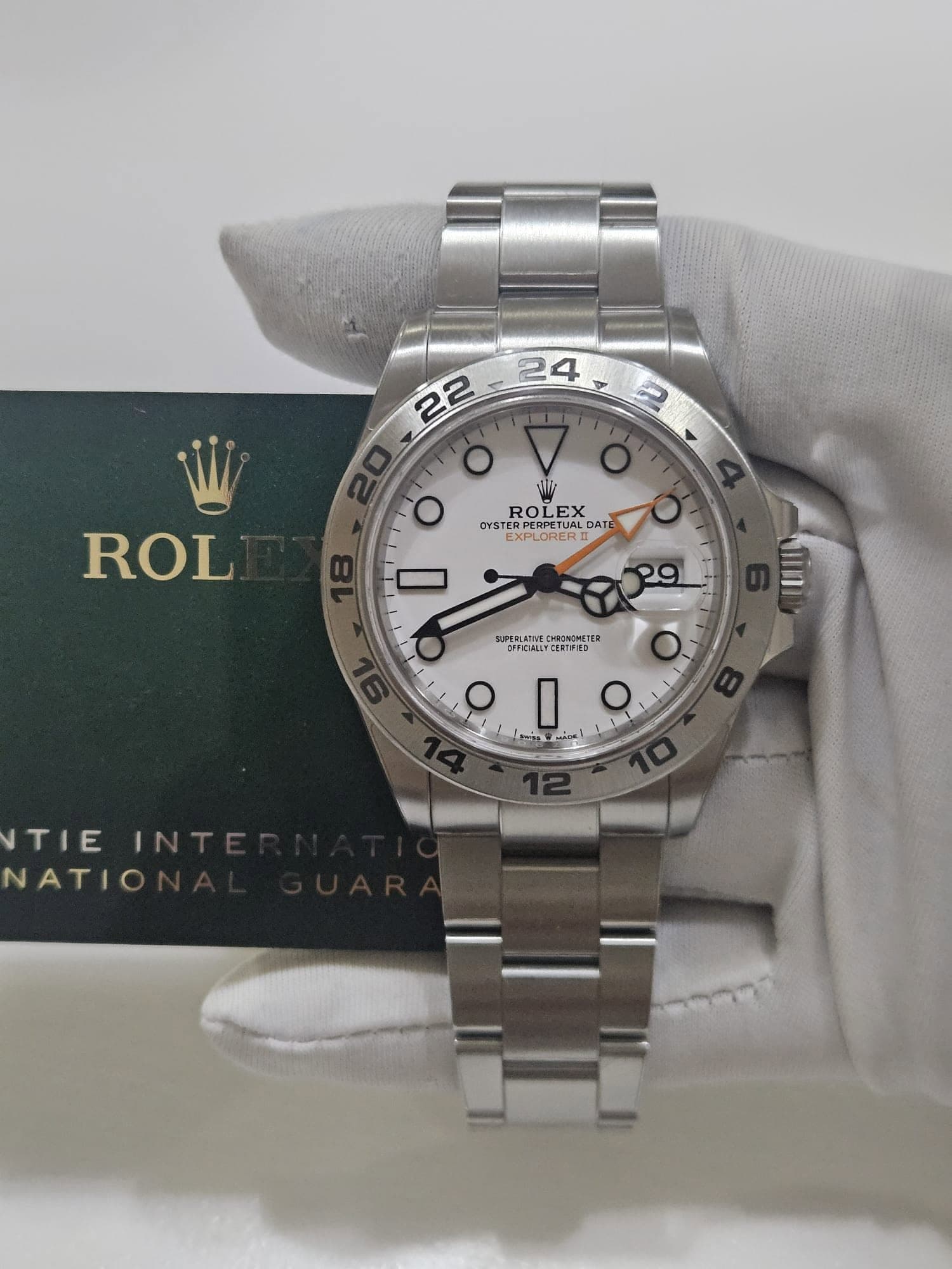 May be an image of wrist watch and text