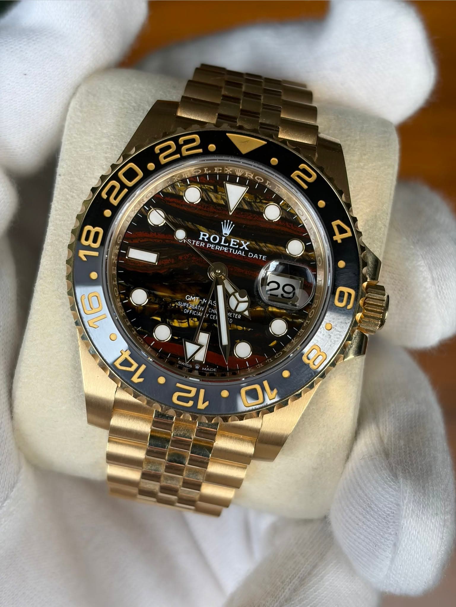May be an image of wrist watch and text