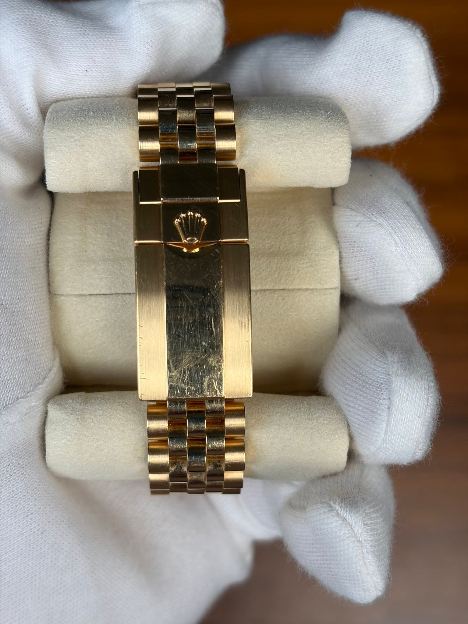 May be an image of wrist watch and text