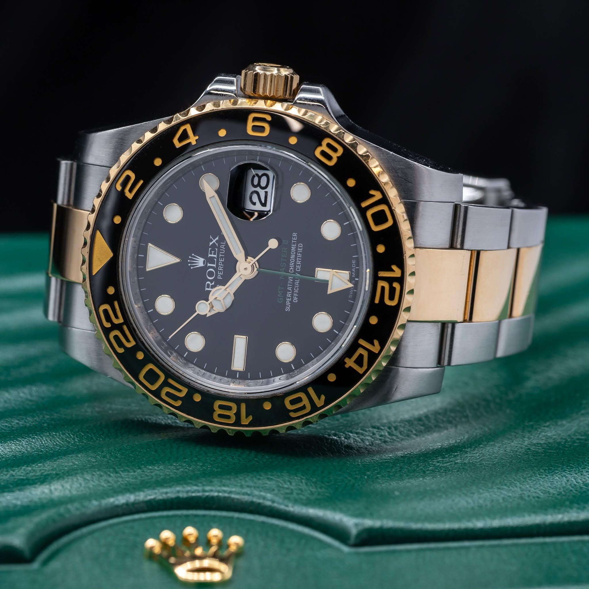 May be an image of wrist watch and text