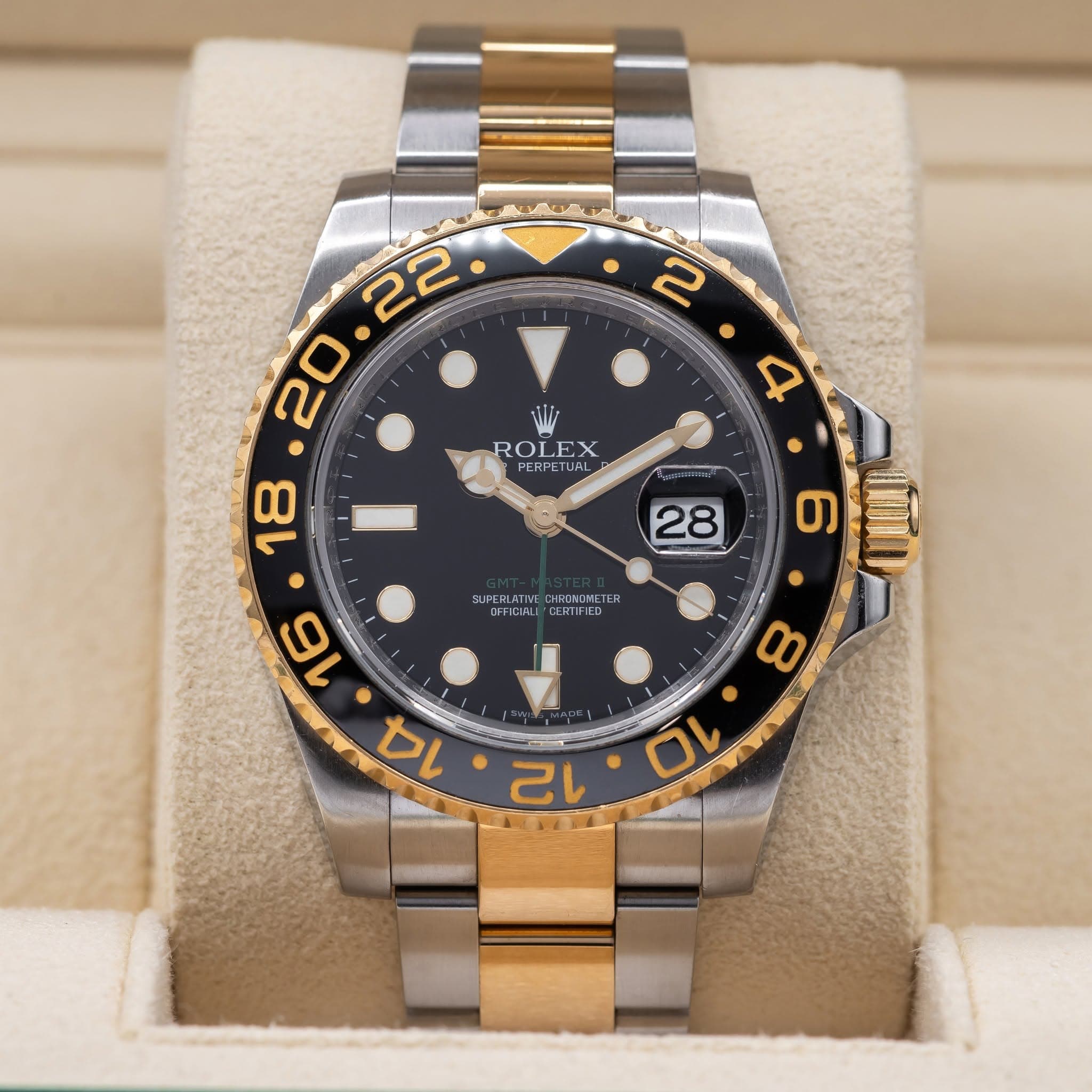 May be an image of wrist watch and text