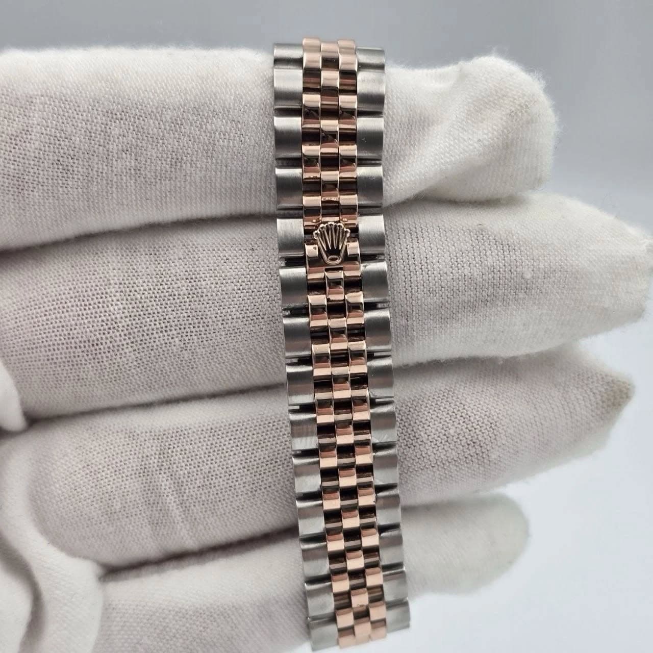 May be an image of wrist watch