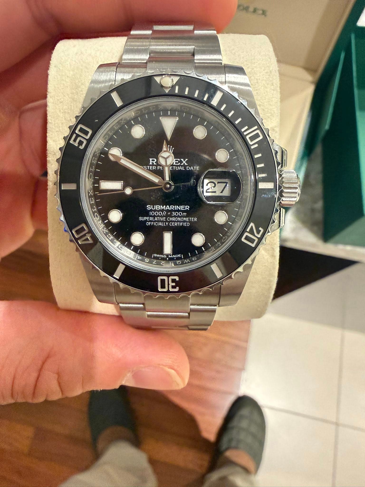 May be an image of wrist watch and text