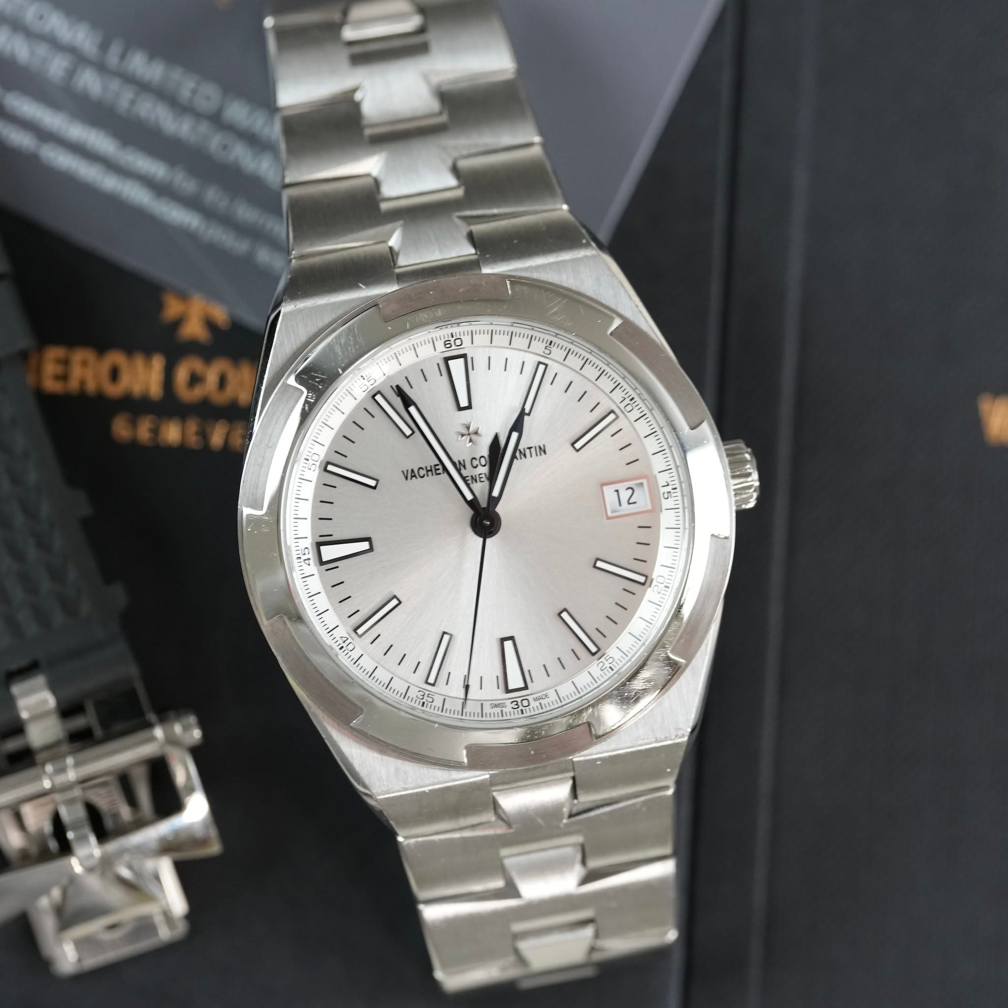 May be an image of wrist watch and text that says 'GRA Bak HC IN 'I' حل VACHE NTIN NCO CO NE 12 451 D. ይማ S'