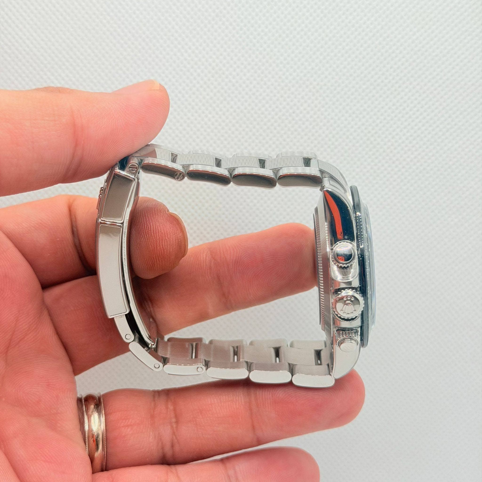 May be an image of wrist watch