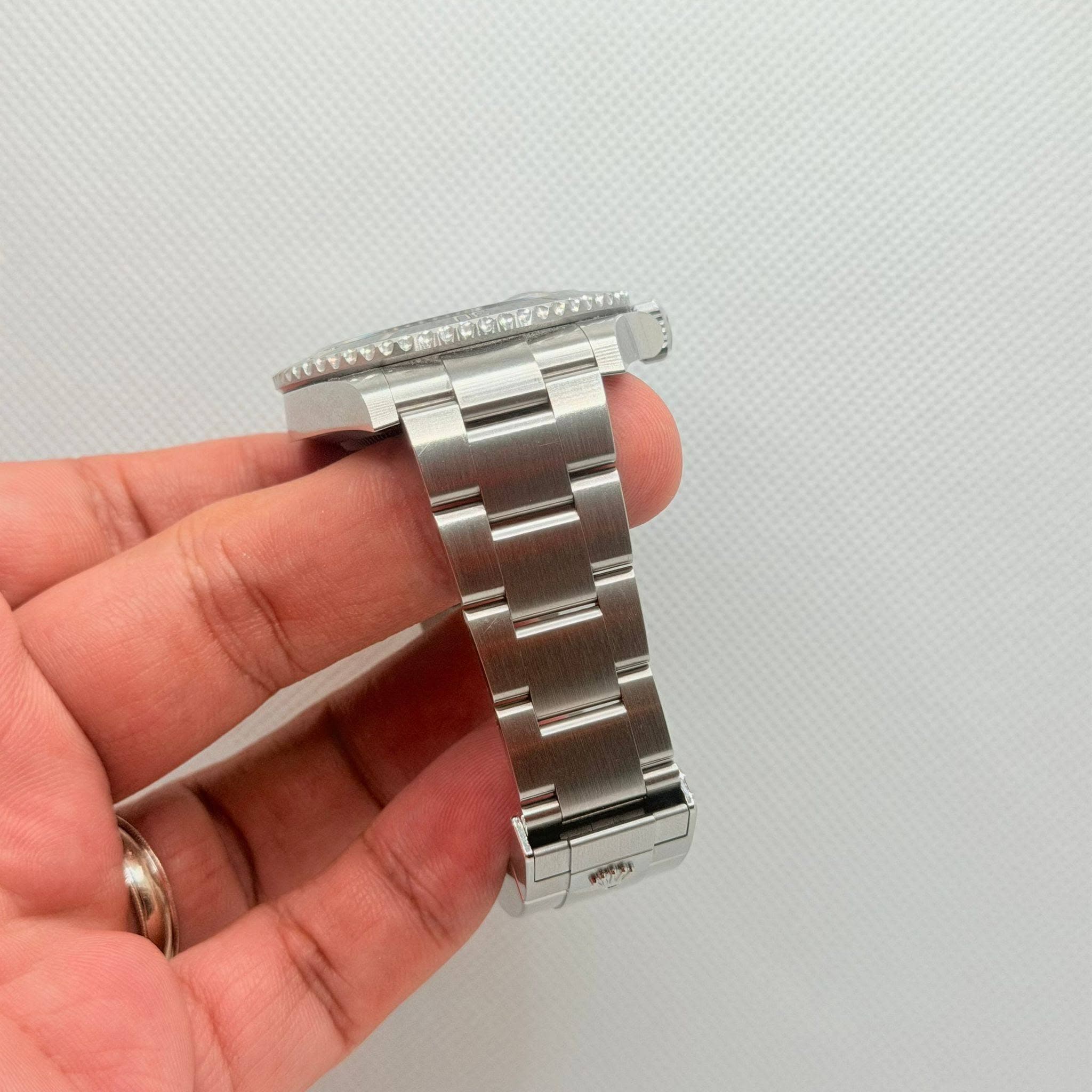 May be an image of wrist watch