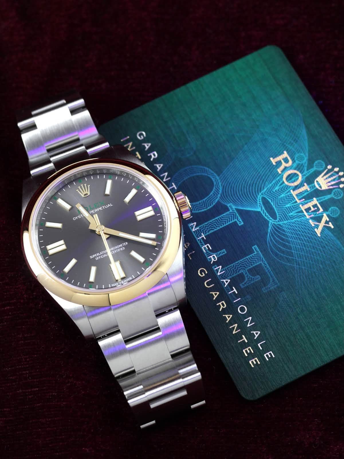 May be an image of wrist watch and text