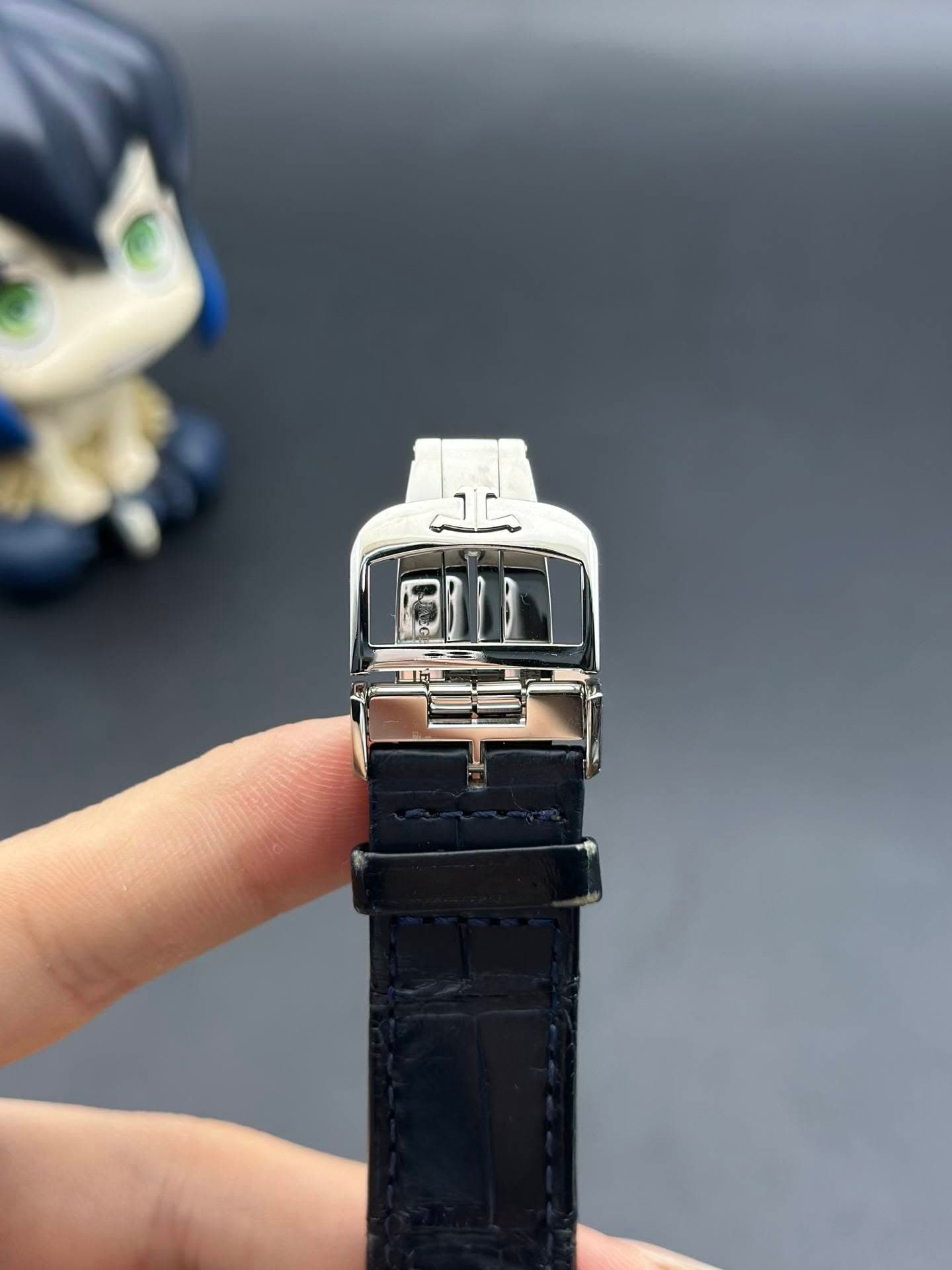 May be an image of digital watch, toy and text