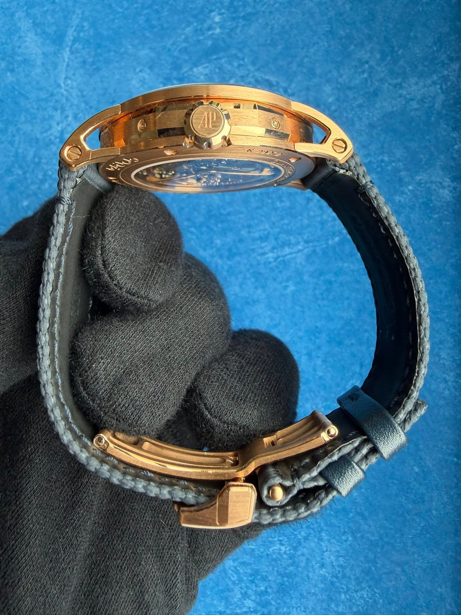 May be an image of wrist watch, jewelry and text