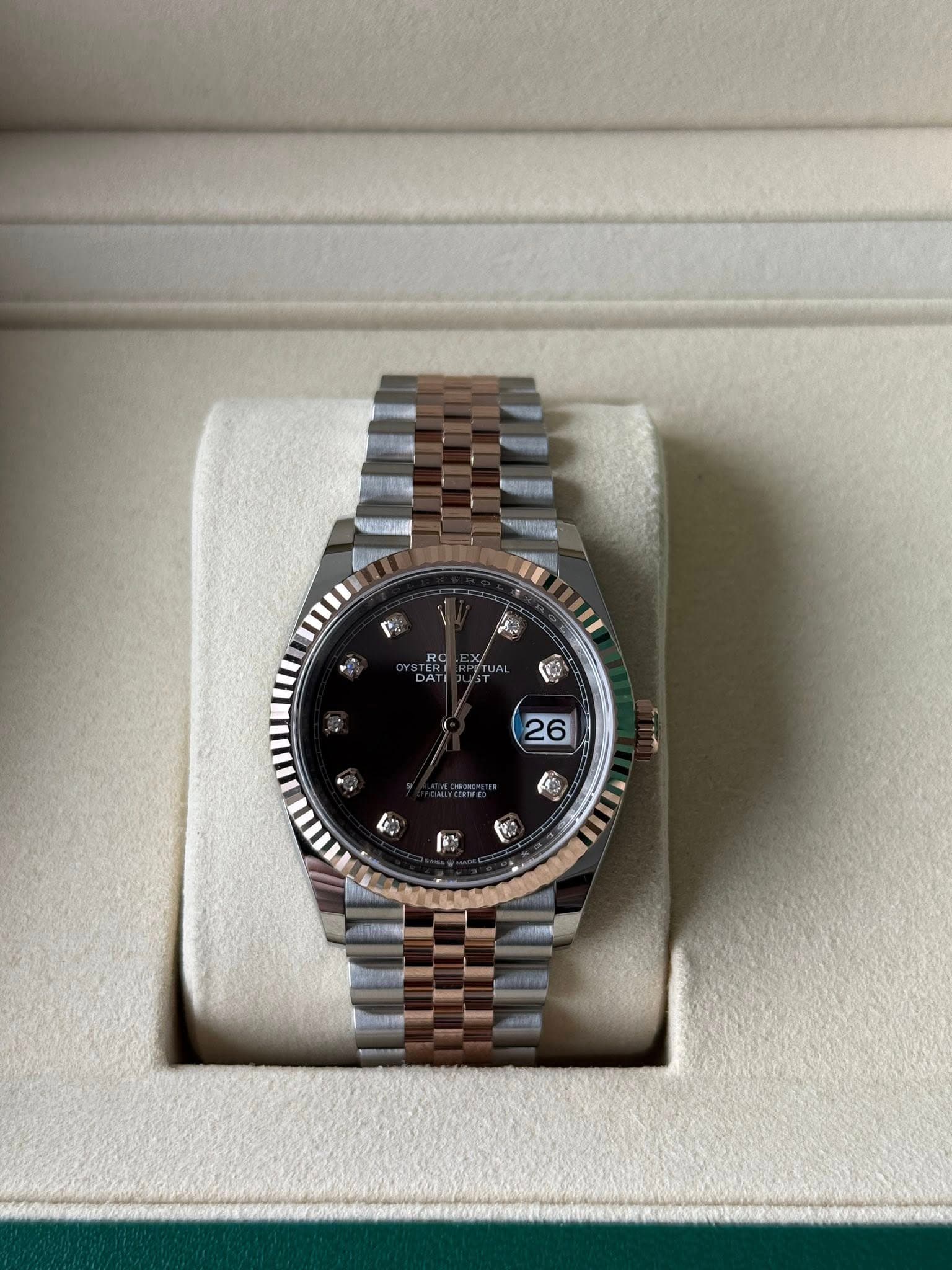May be an image of wrist watch and text