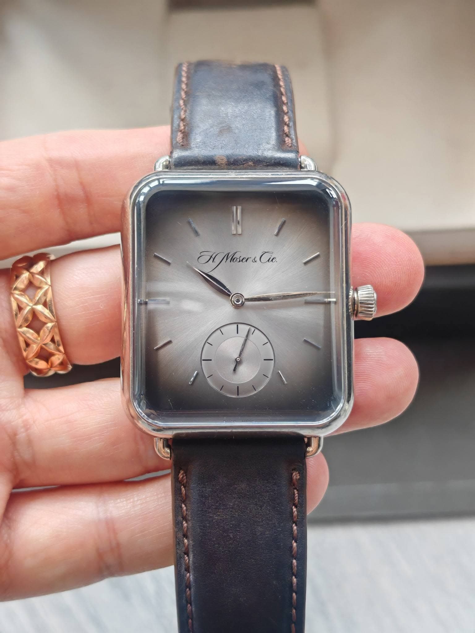 May be an image of wrist watch and text that says 'MMeser&Cie Moser& Cie.'