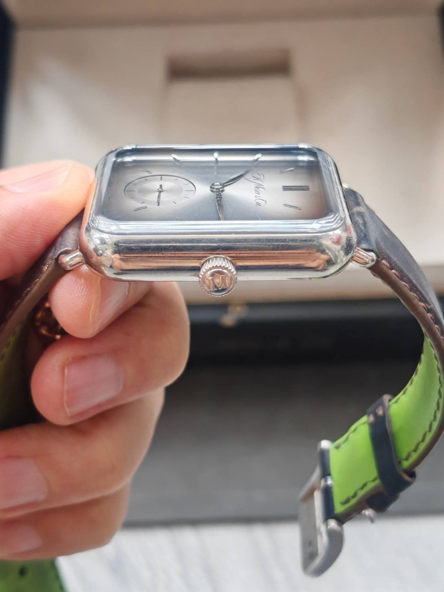 May be an image of wrist watch and text