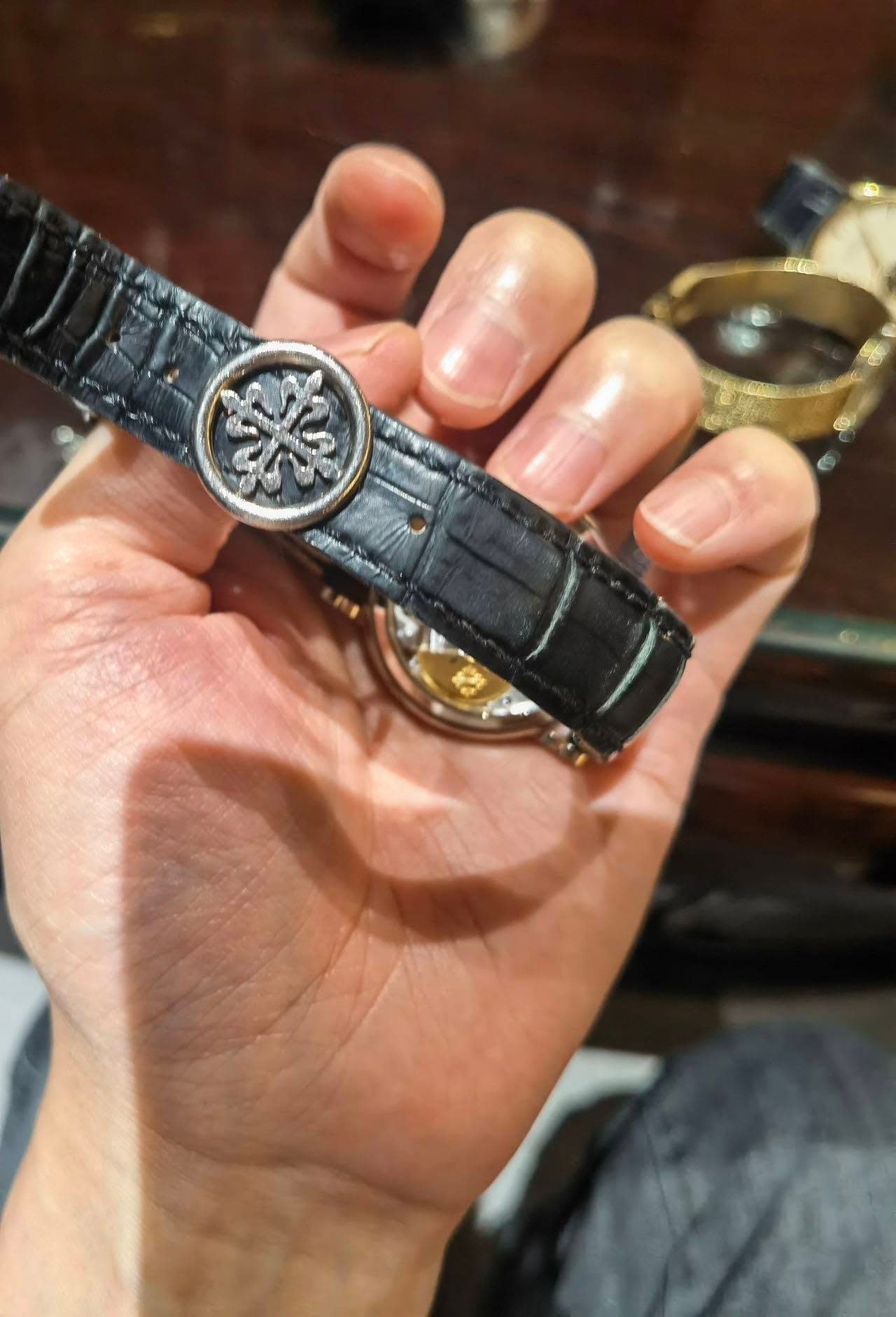 May be an image of wrist watch