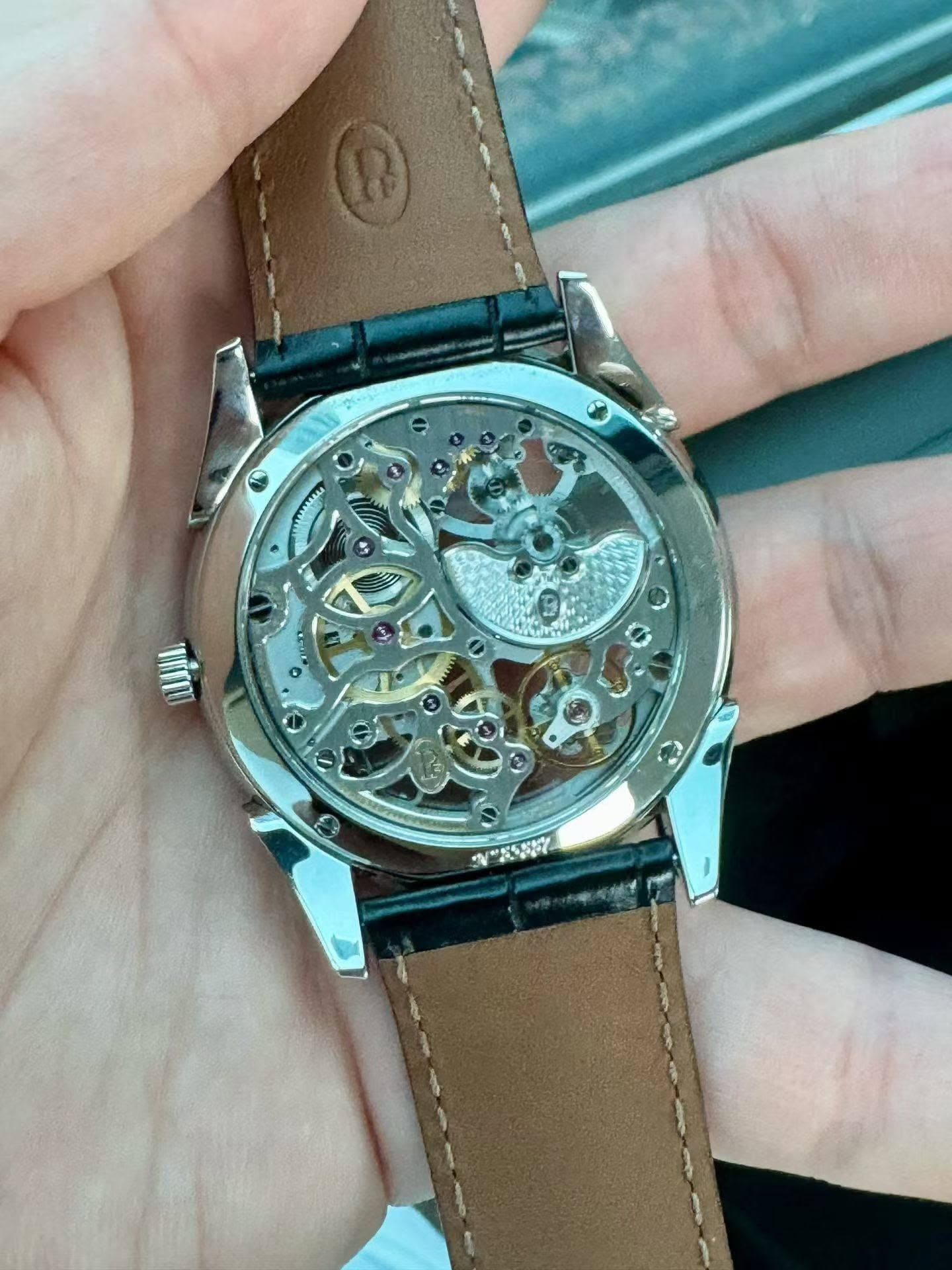 May be an image of wrist watch