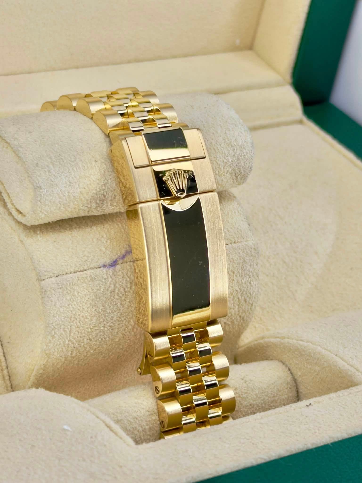 May be an image of jewelry and wrist watch