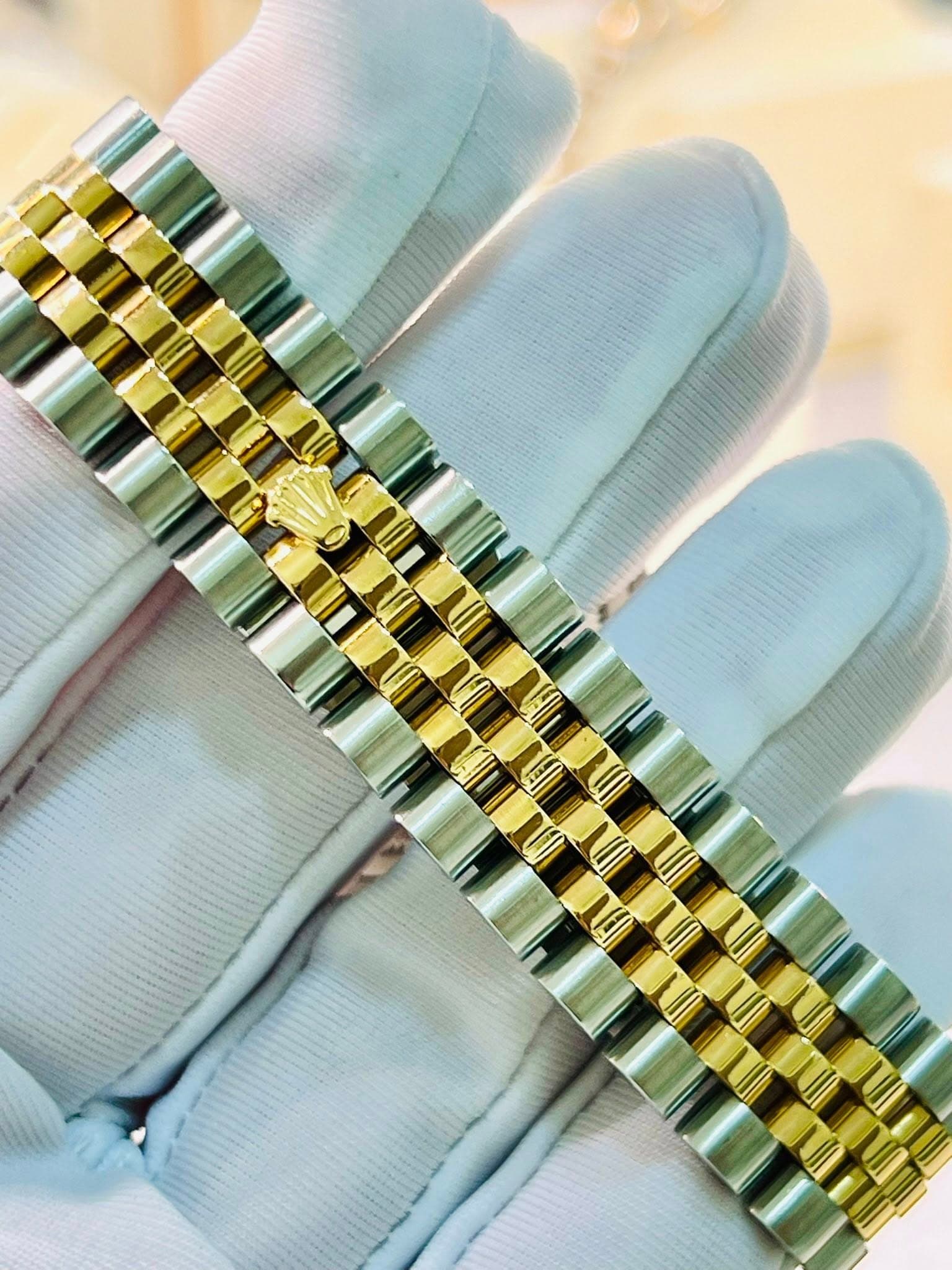May be an image of wrist watch