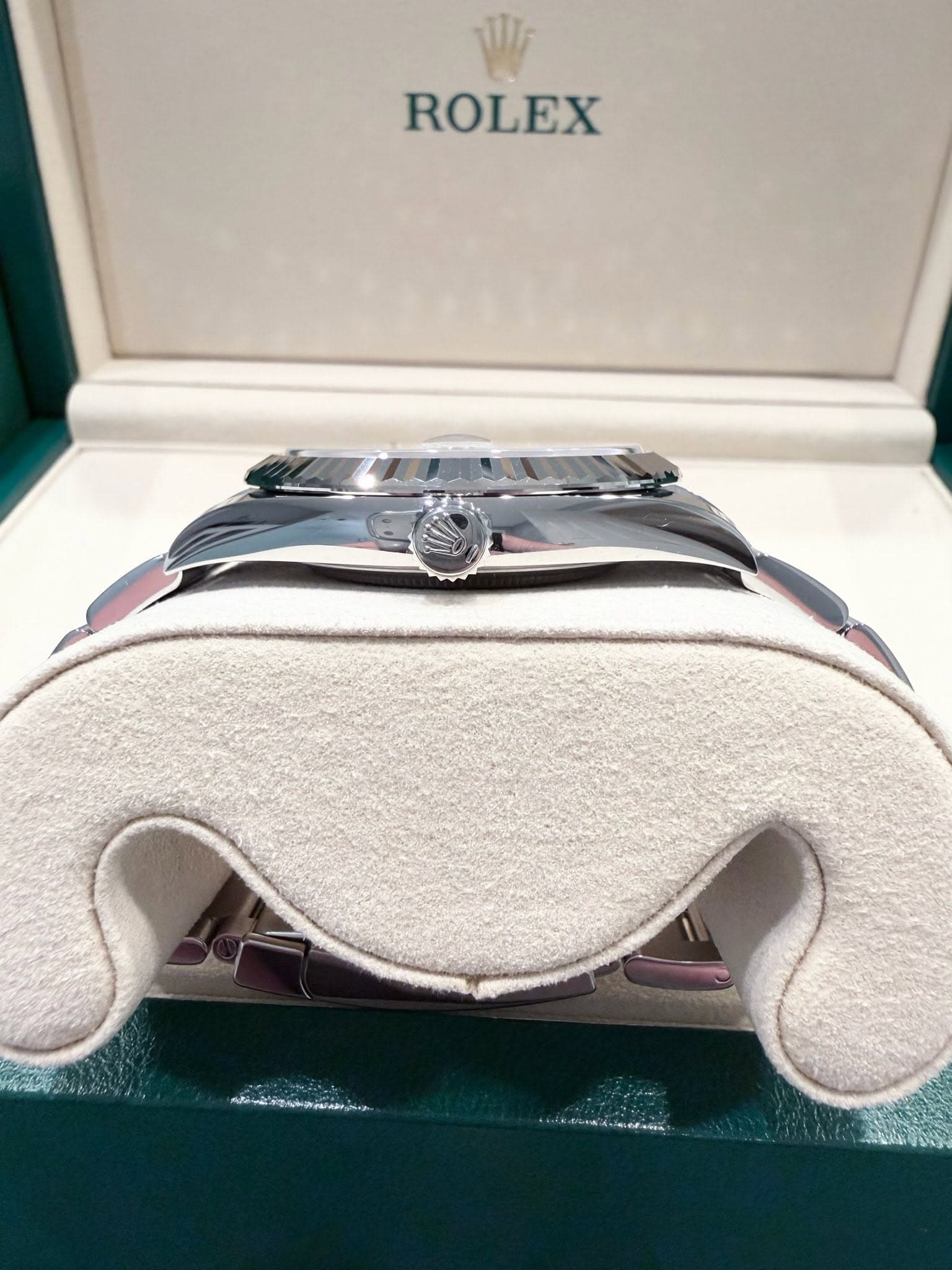 May be an image of wrist watch and text