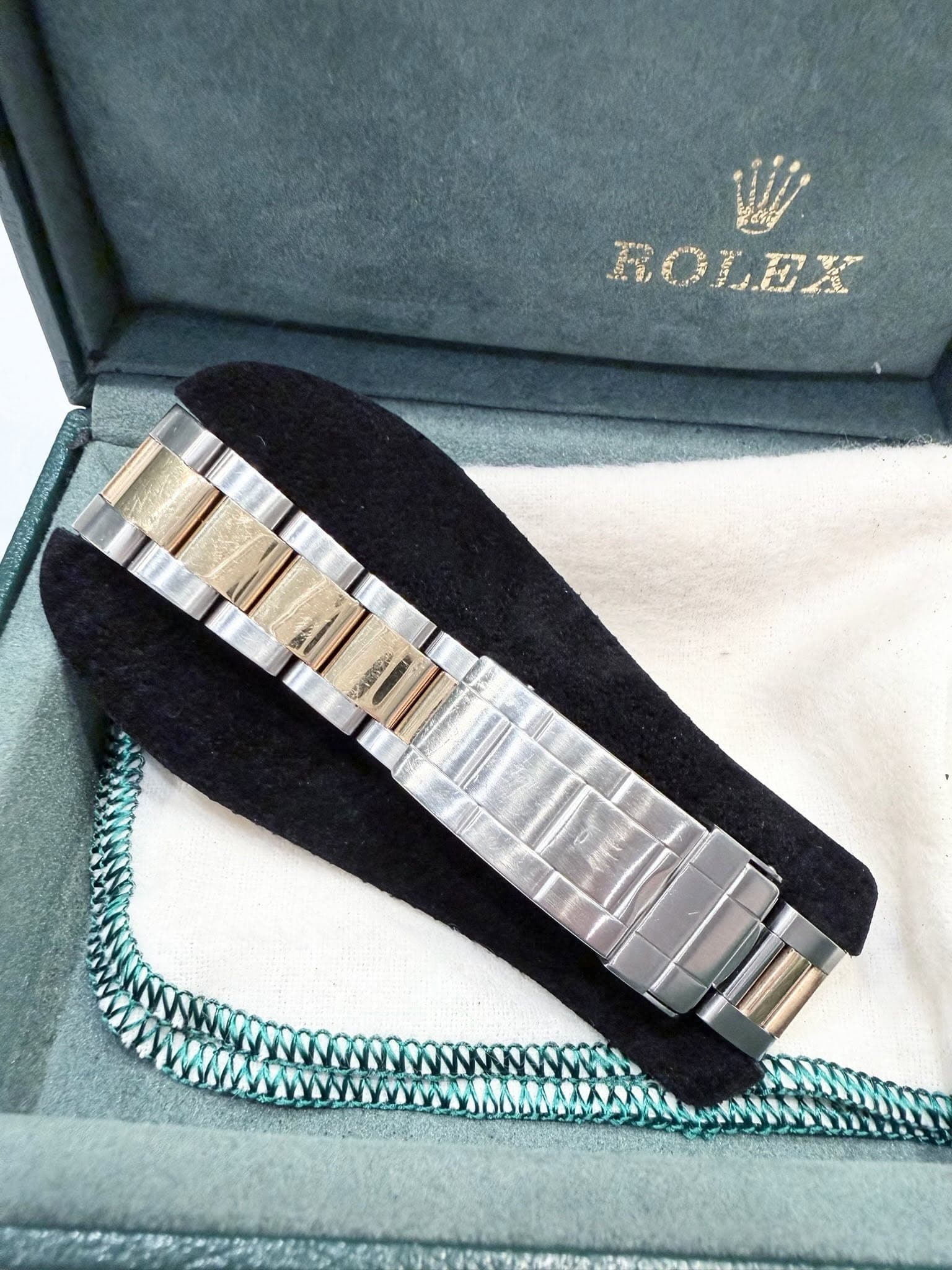May be an image of wrist watch and text that says 'ROLEX'