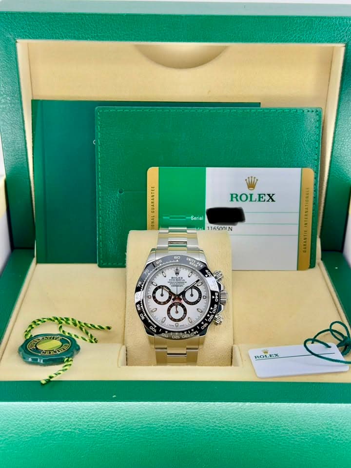 May be an image of wrist watch and text that says 'GUARANTEE N IONAL ROLEX Serial ไมไม 11650 N INTERNATIONALE ONITEPER 40g AD 840 I علن 0 90 0 ن 3 8 O 0리 ODO ROL ROLEX'
