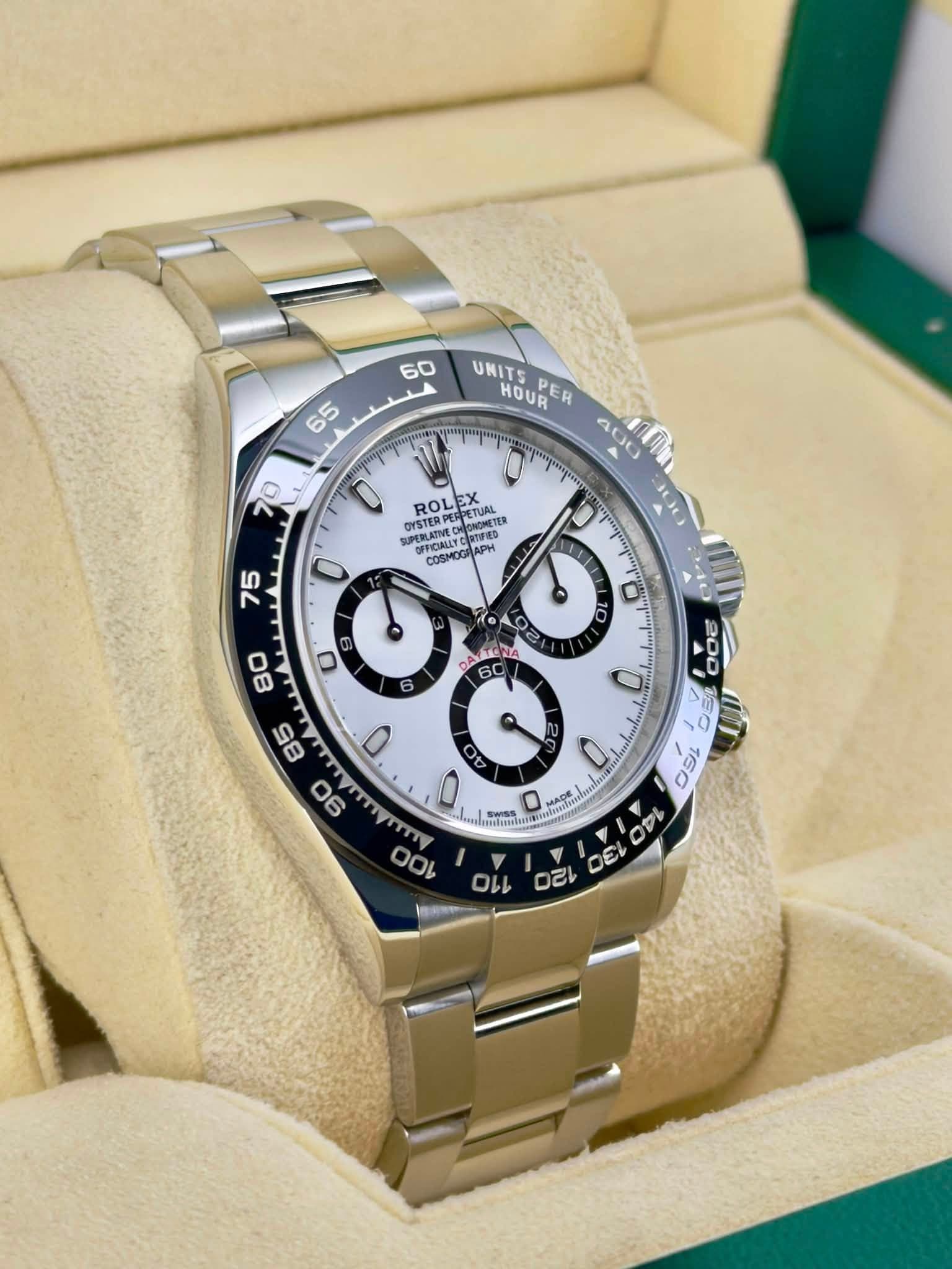 May be an image of wrist watch and text that says '60 65 UNITS HOUR PER หุณ 70 ROLEX PETURL MISTER PERLATINES ONOMETER OFFICIALLYCOTOTED COSMOG COSMOGRAPI APH 75 1 Ho 9 10 TONA…
