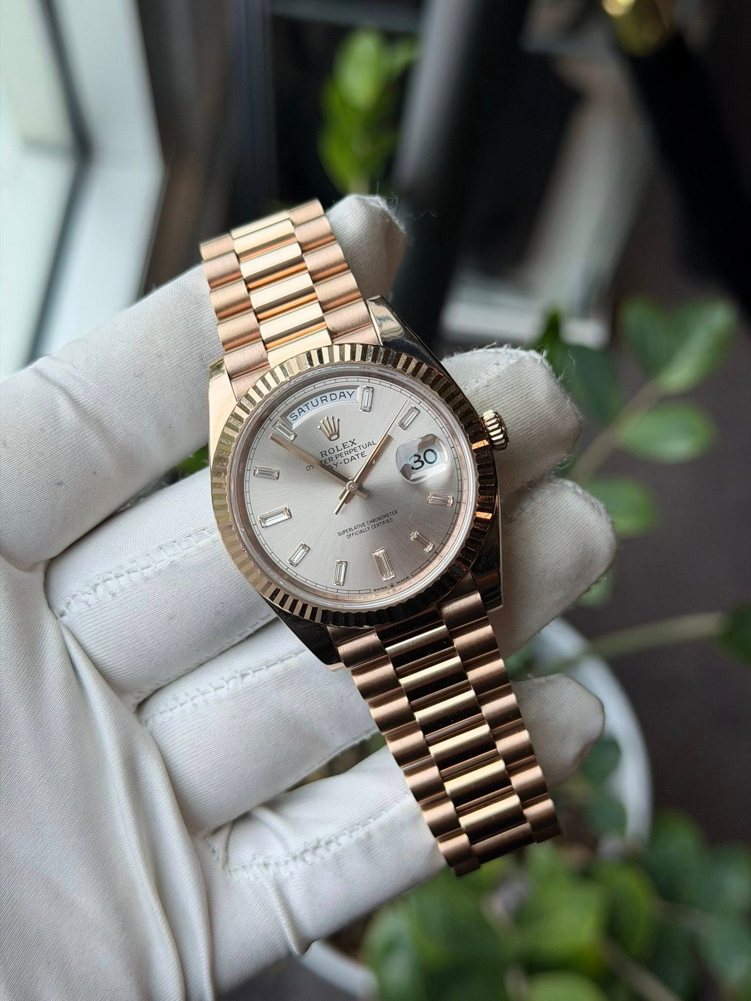 May be an image of wrist watch and text