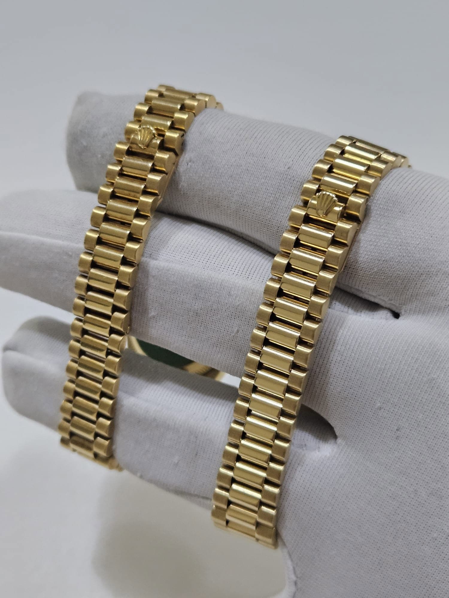 May be an image of jewelry and wrist watch