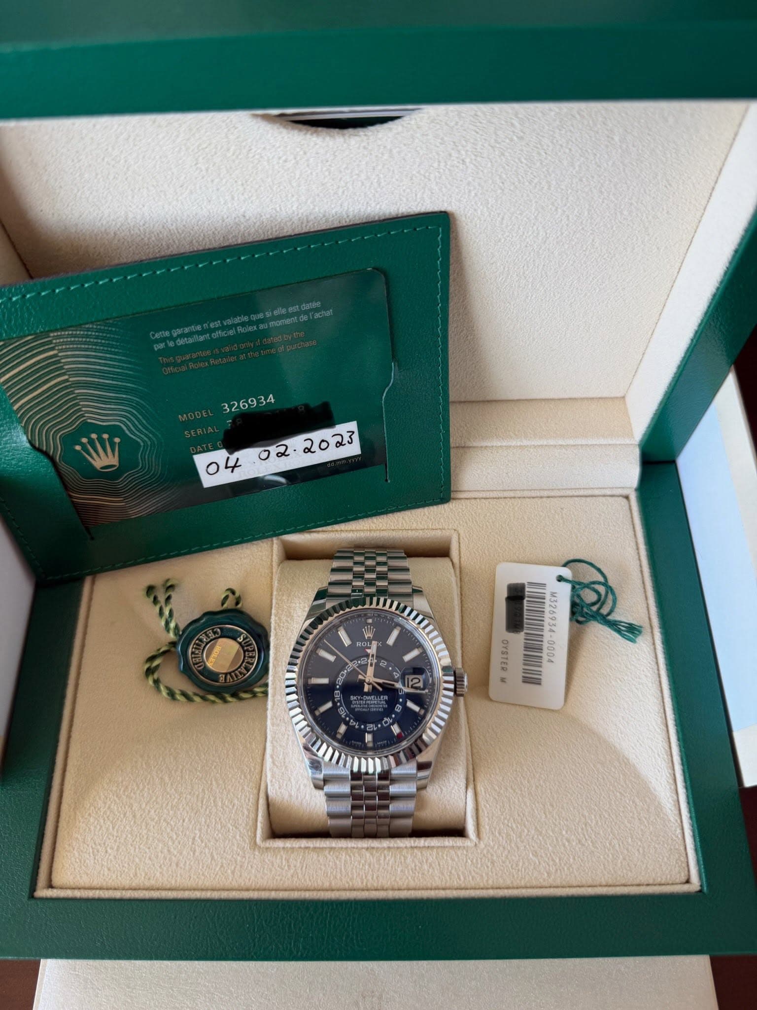 May be an image of wrist watch and text