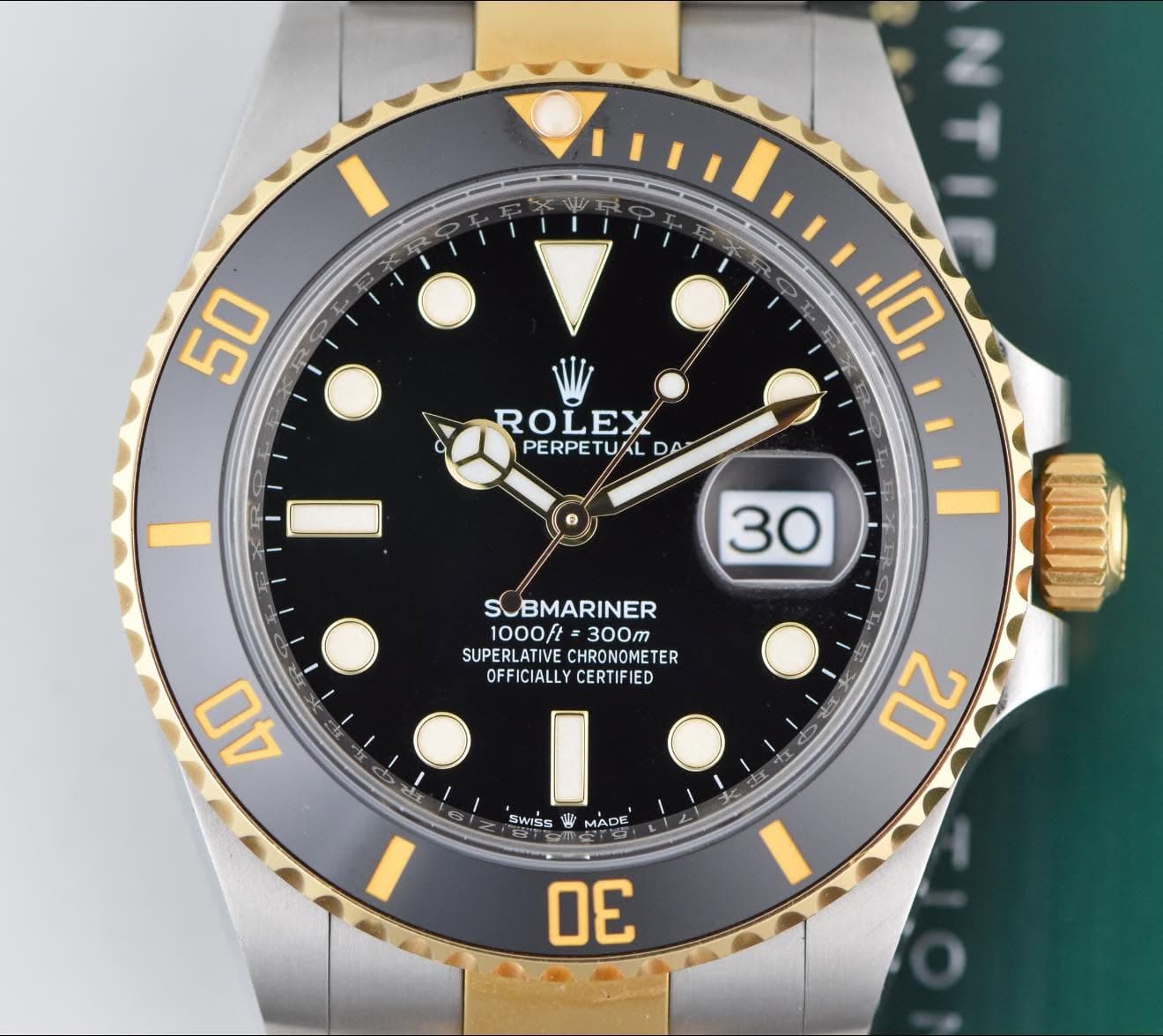 May be an image of wrist watch and text that says '50 10 ROLEX PERPETUAL TUAL DA I 30 SOBMARINER 1000t 300m SUPERLATIVE CHRONOMETER OFFICIALLY CERTIFIED 40 V ሌጋ แดก 20 SWISS ቀ MADE…