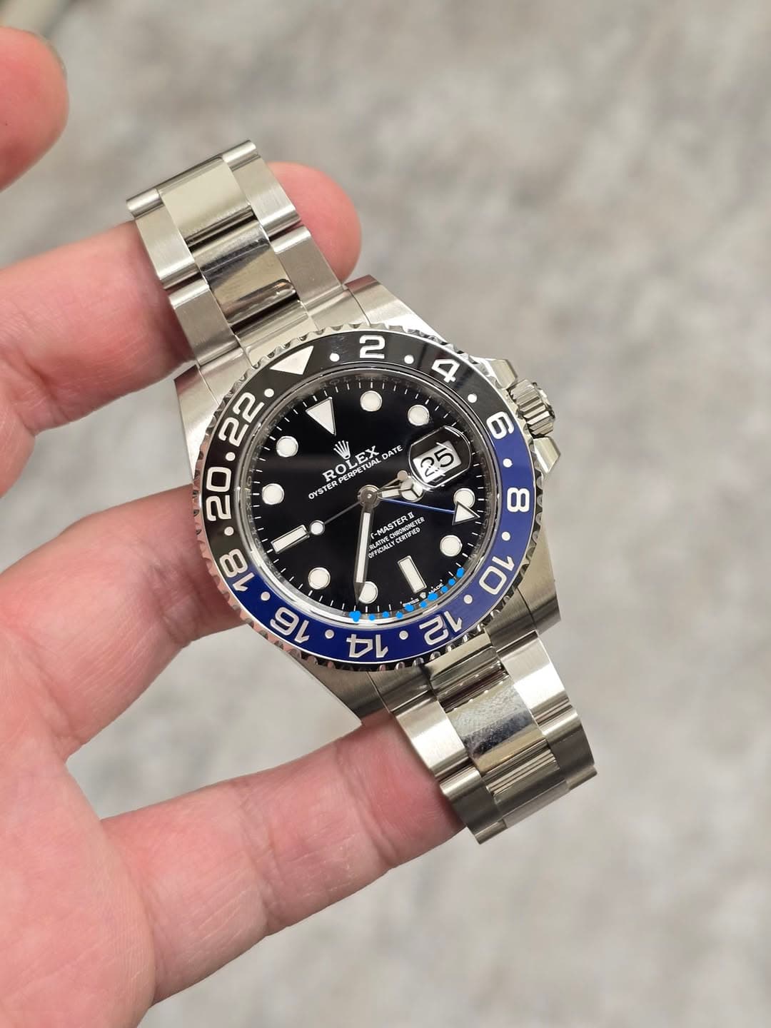 May be an image of wrist watch and text