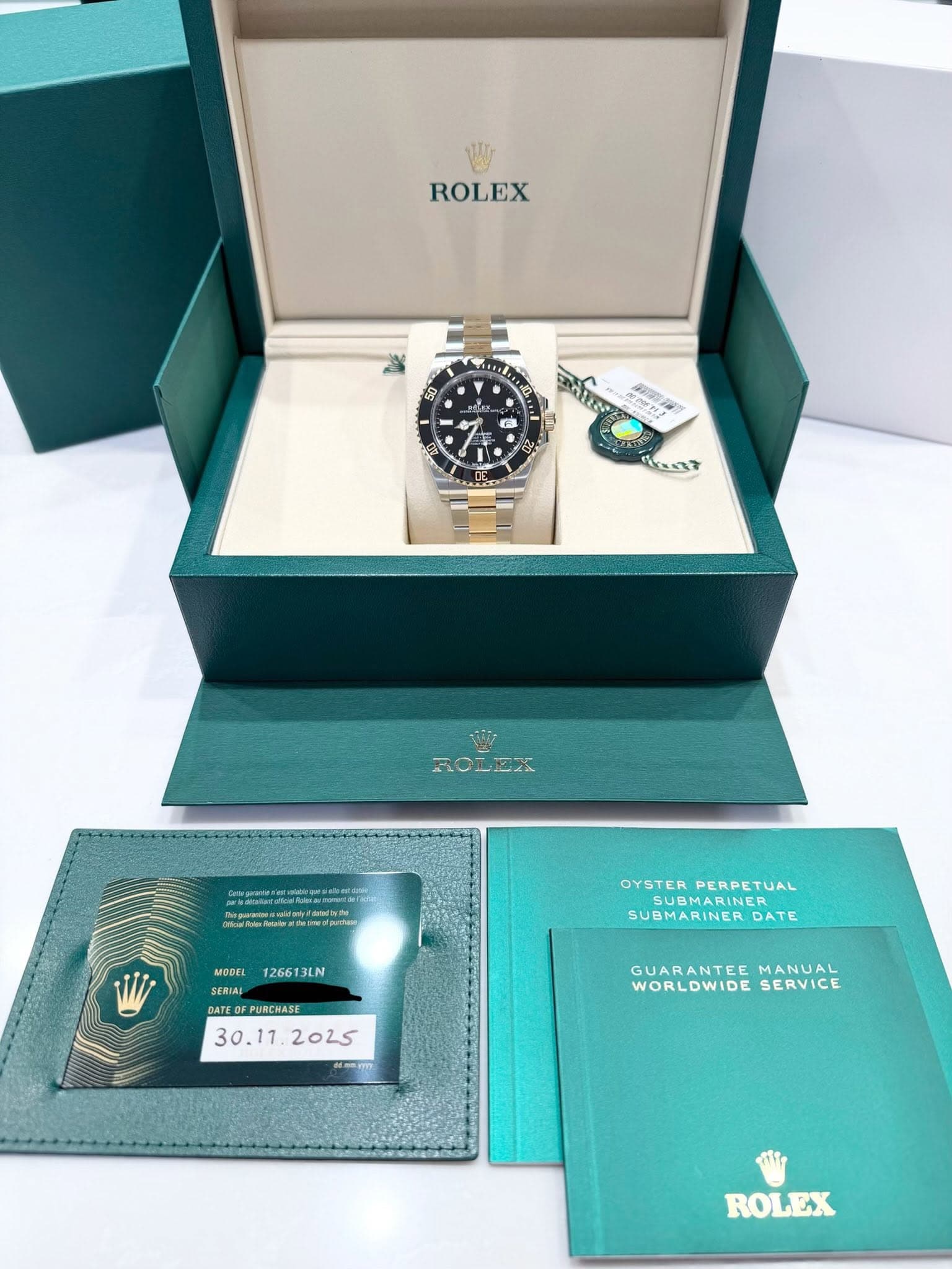 May be an image of wrist watch and text that says 'ROLEX 起 អភ MARE C- ROLEX Sopecetooow.l MODEL 126613LN OYSTERPERPETUAL OYSTER PERPETUAL SUBMARINER SUBMARINER. SUBMARINERDATE…