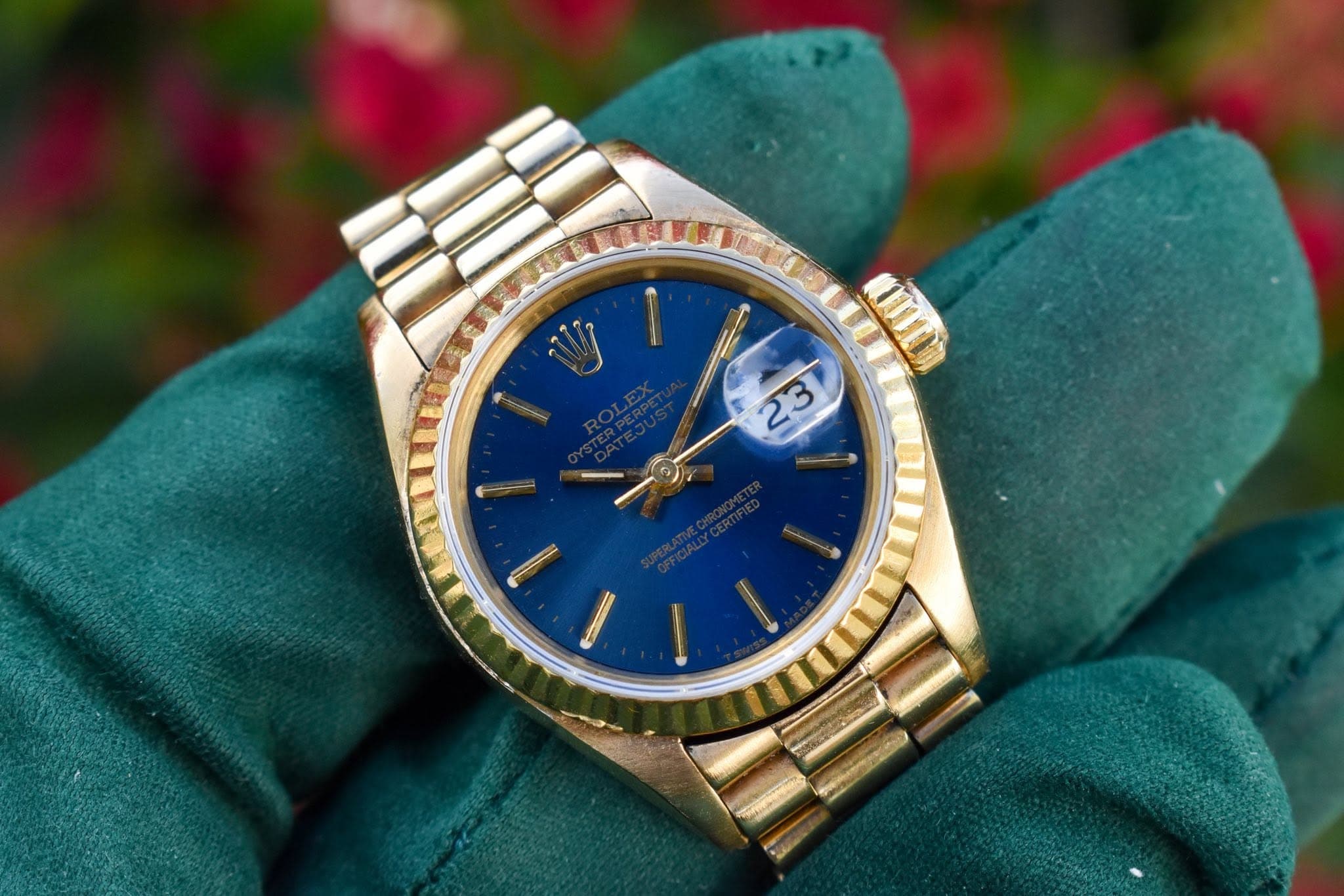 May be an image of wrist watch and text