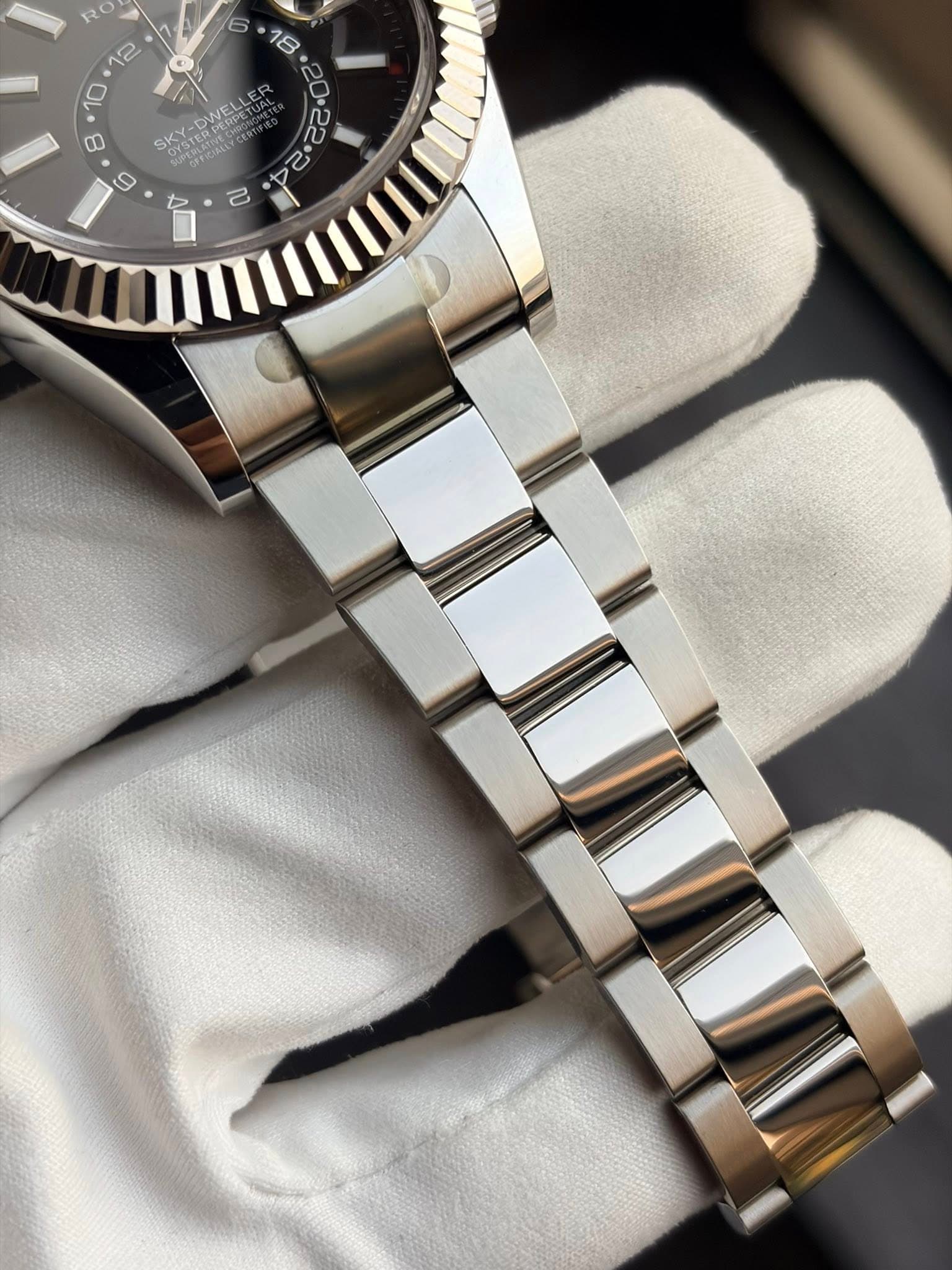 May be an image of wrist watch and text