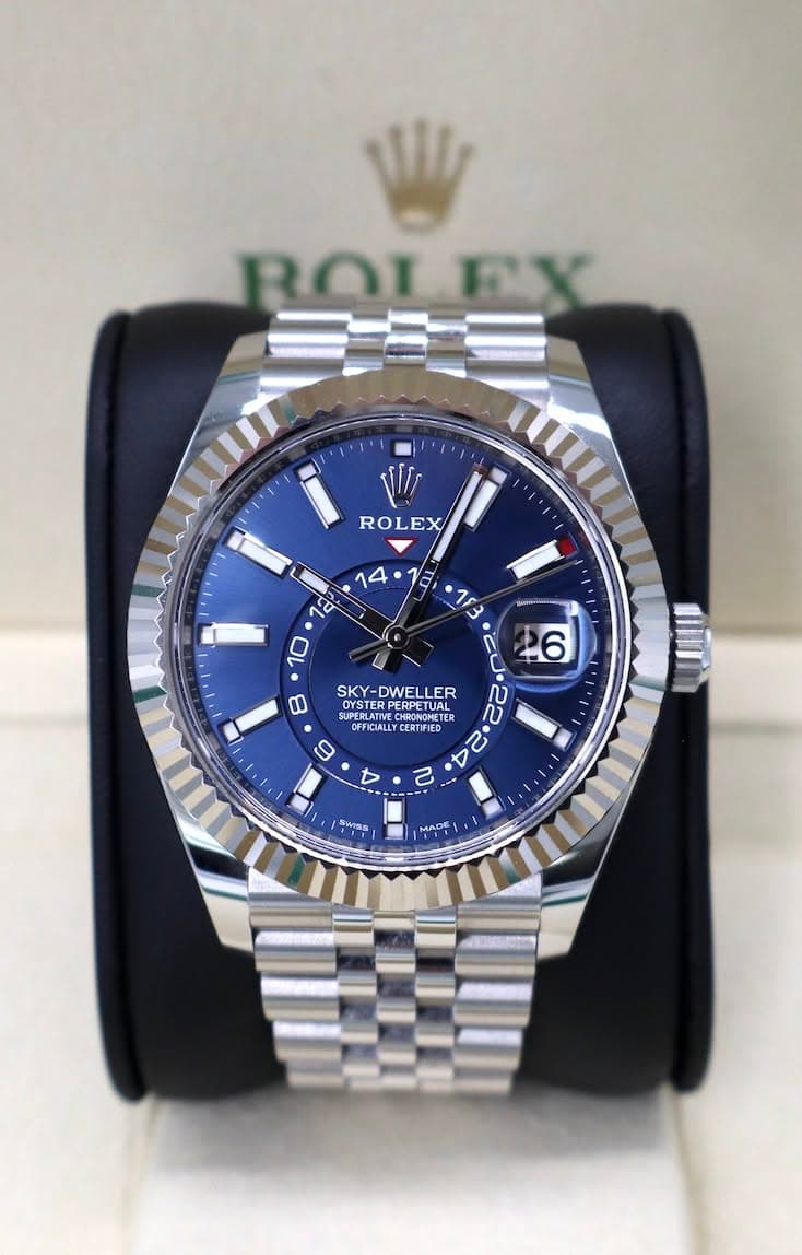 May be an image of wrist watch and text that says 'ROLFX NII ROLEX EI 183 ወ SKY-DWELLER SKY- WELLER OYSTER OISTER SUPEBLATIV PERPETUL CHRONOMETER RPETUAL OFFICIALLY CERTFD O n ₪ 10…