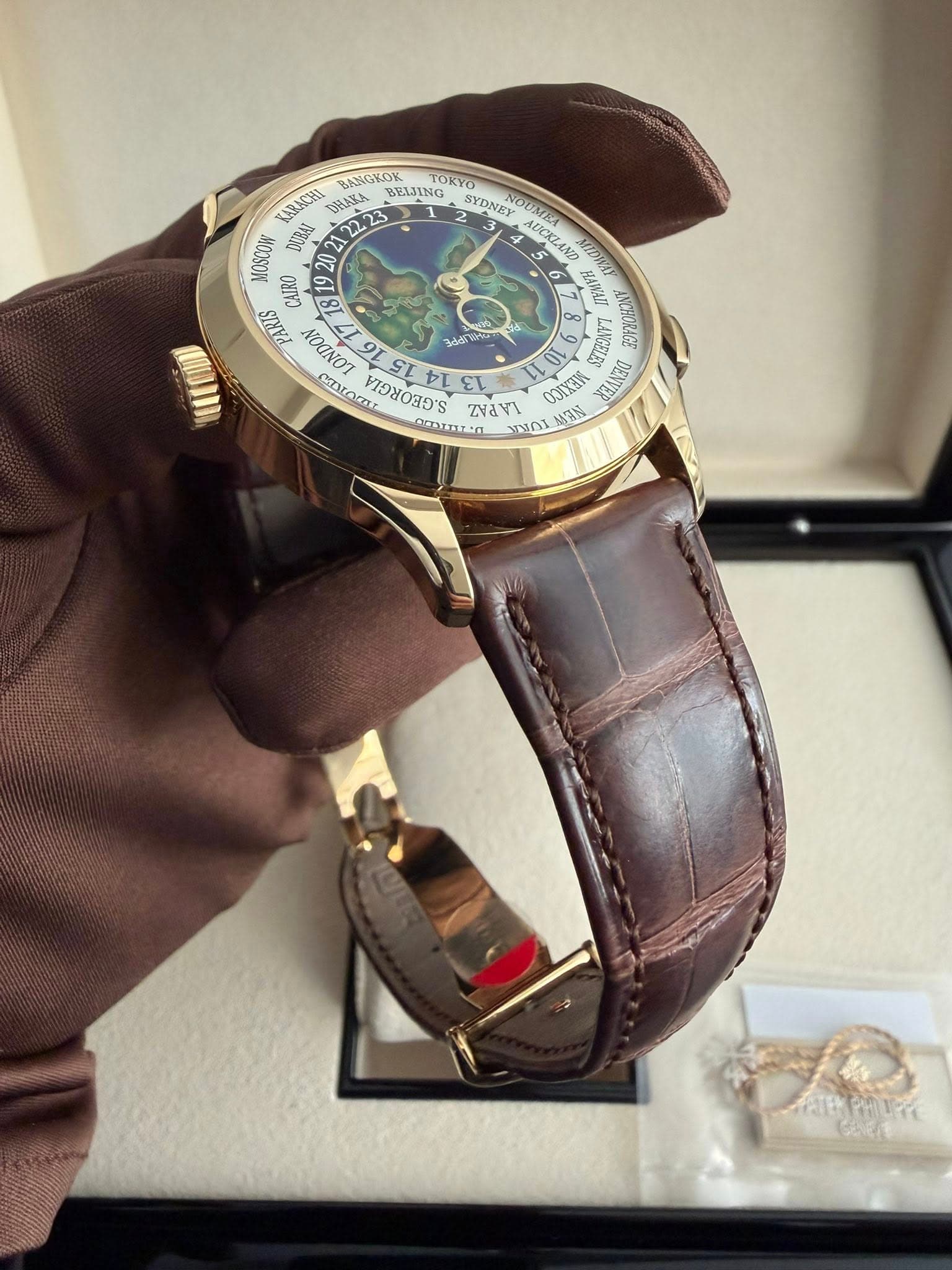 May be an image of wrist watch and text