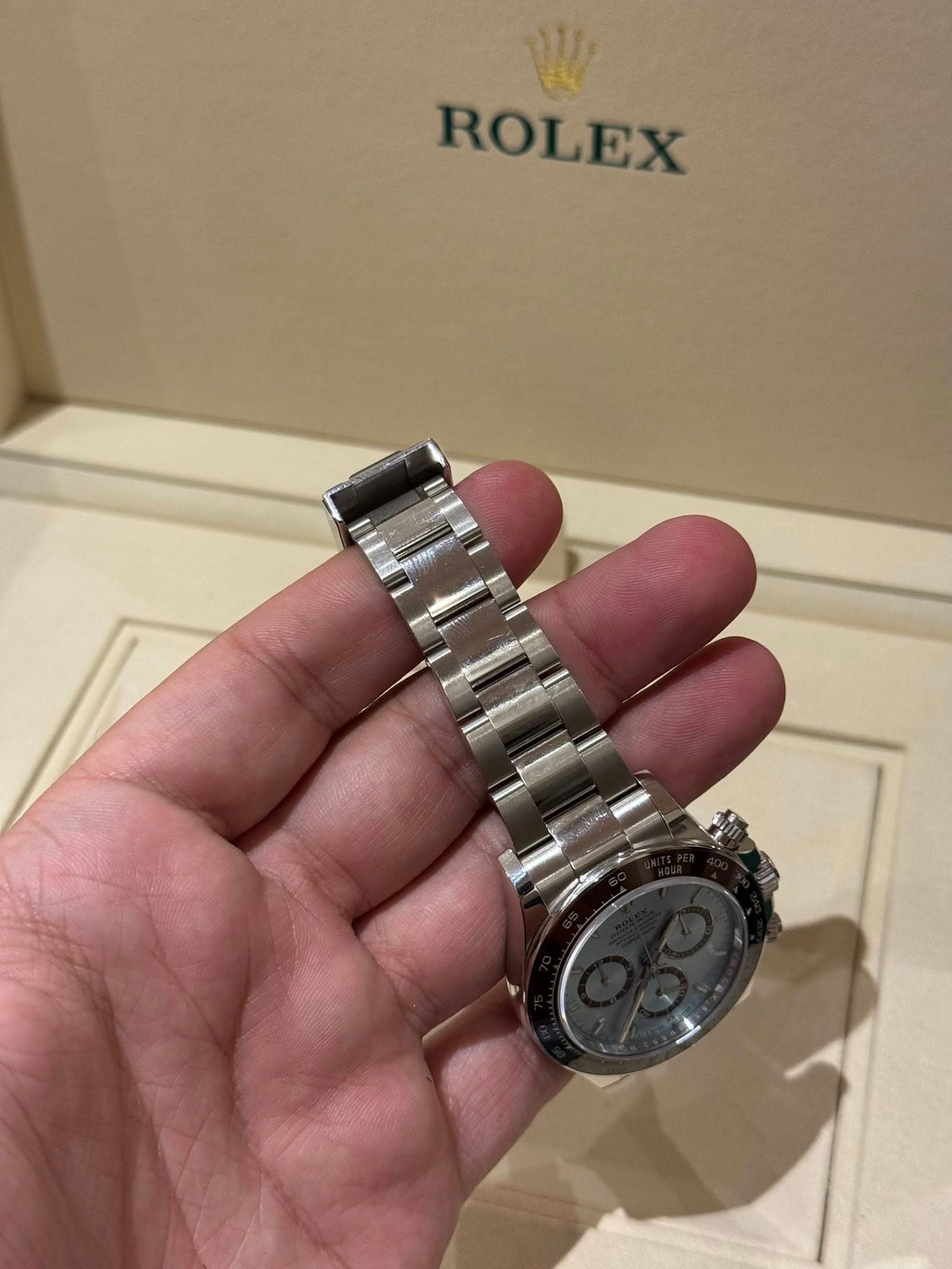 May be an image of wrist watch and text that says 'ROLEX'