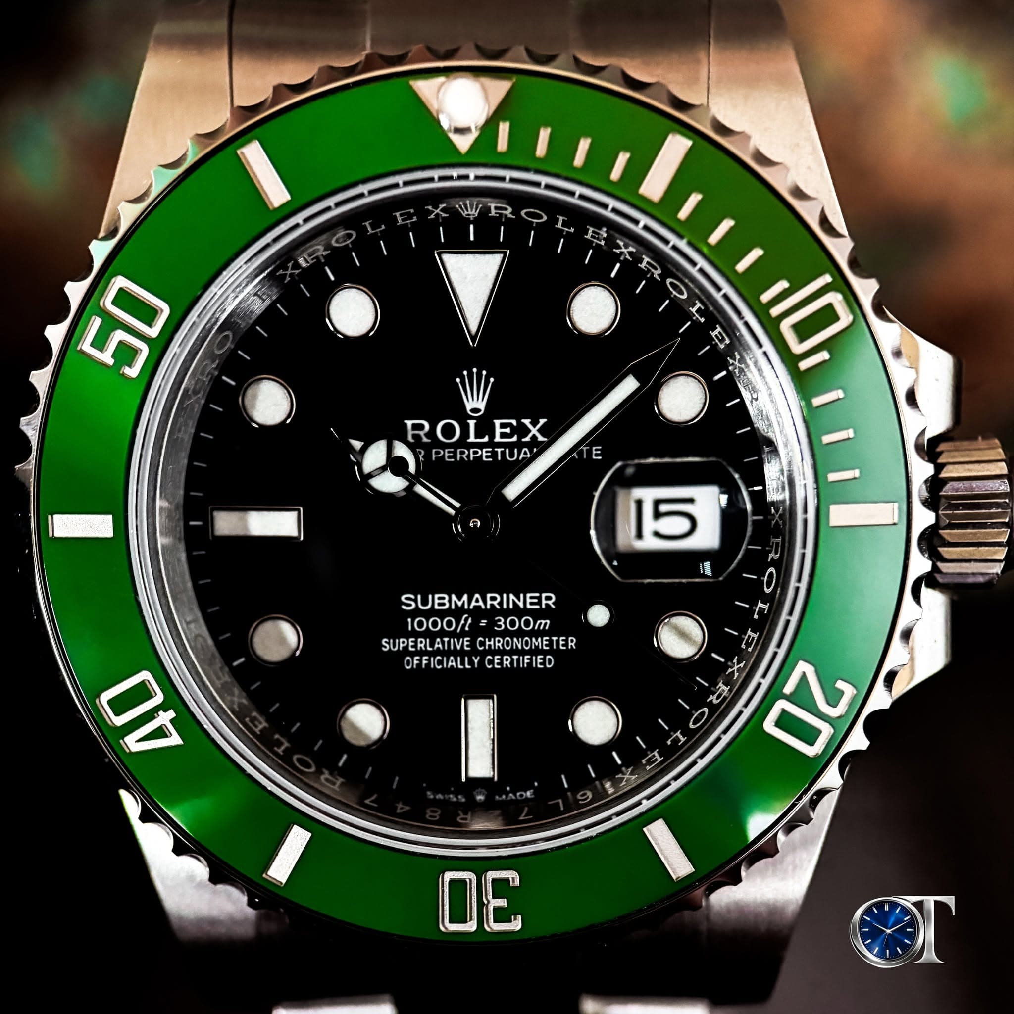 May be an image of wrist watch and text that says '50 ROLEX PERPETUA UA E 10 15 65 SUBMARINER 1000ft= 300m SUPERLATIV HRONOMETE TER OFFICIALLY CERTIFIED O4 工 / 20 ㅂ 4 ሕ DE OT'