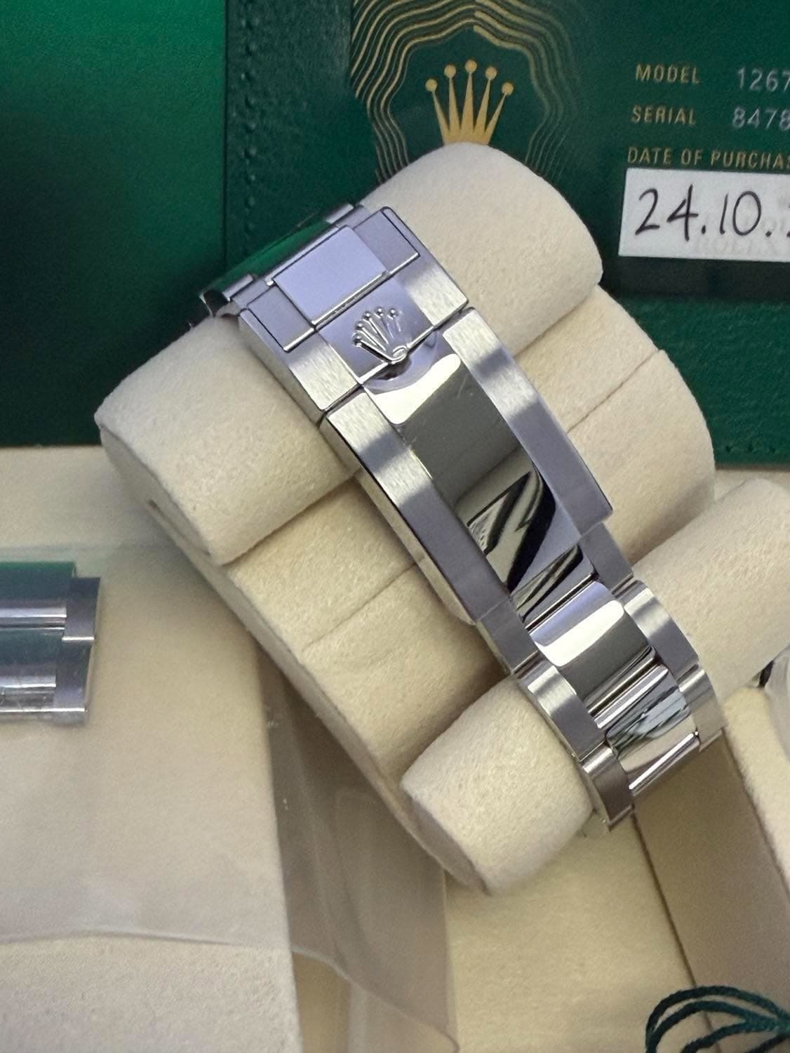 May be an image of ring, wrist watch and text