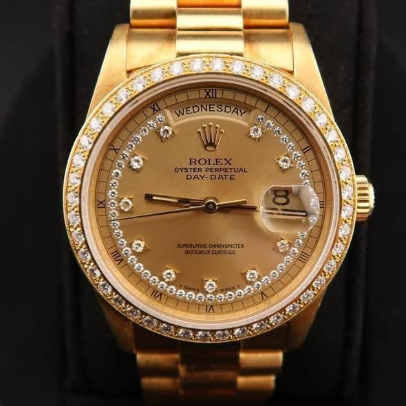 May be an image of wrist watch and text