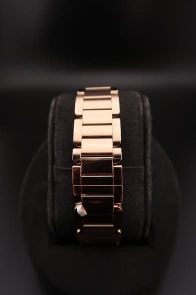 May be an image of jewelry and wrist watch
