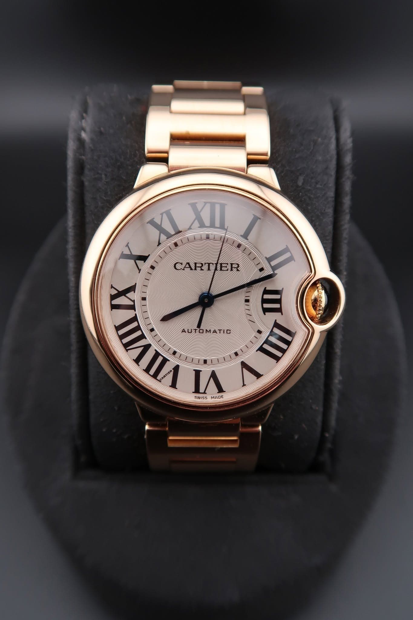 May be an image of wrist watch, jewelry and text