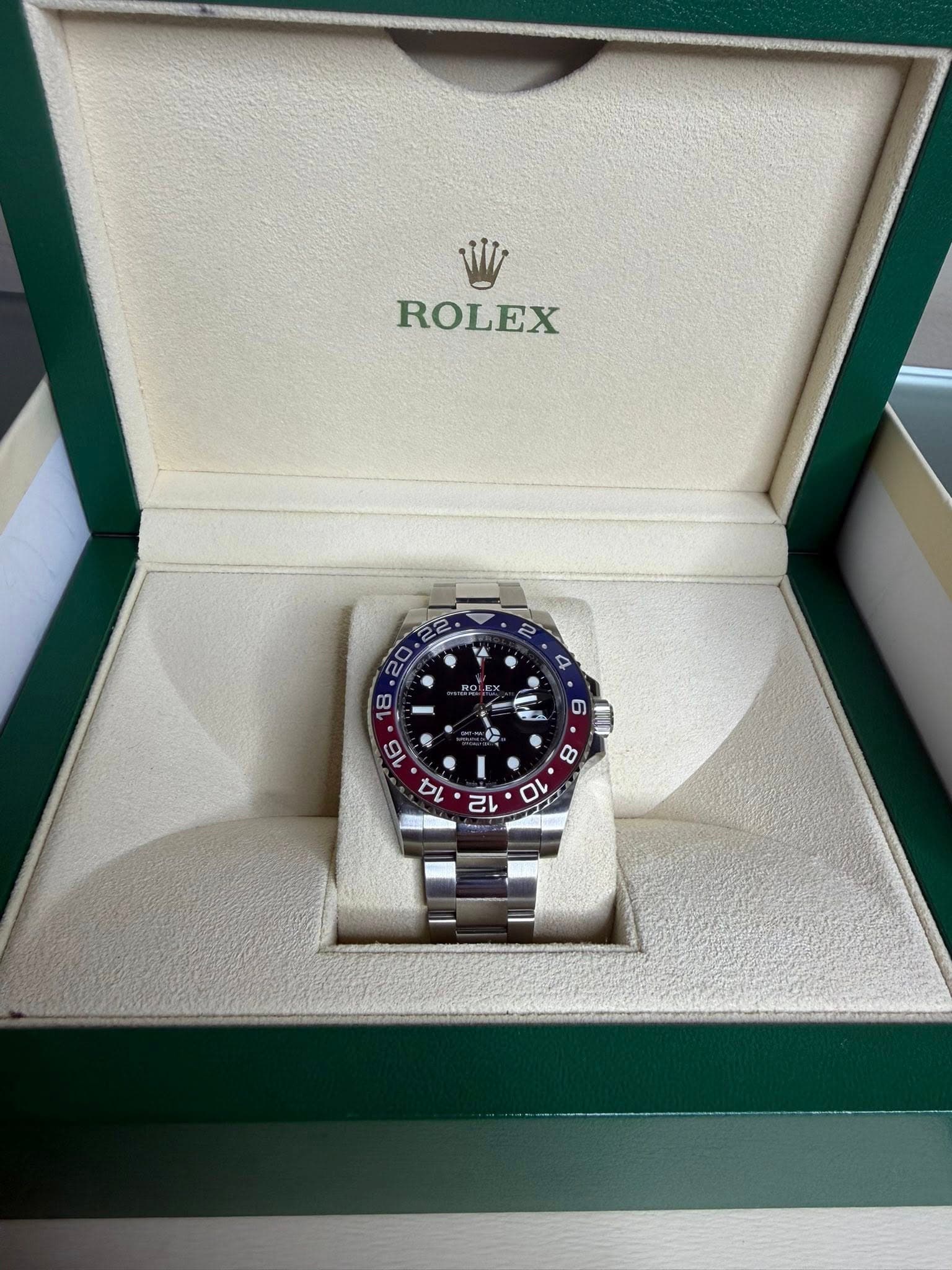 May be an image of wrist watch and text
