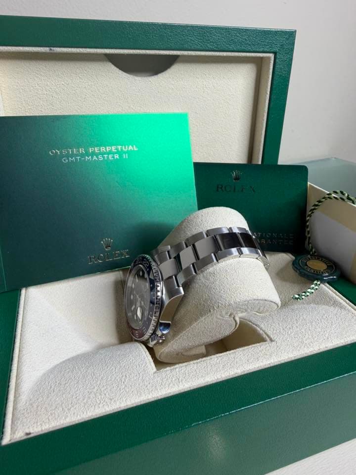 May be an image of wrist watch and text that says 'OYSTER YSTERPERPETUAL PERPETUAL GMT-MASTER ASTER'
