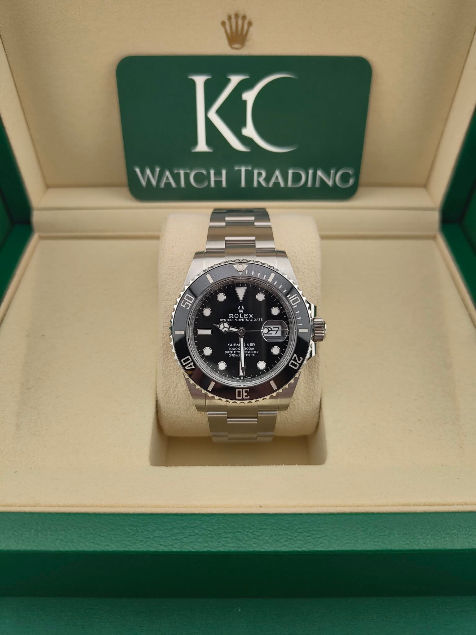 May be an image of wrist watch and text that says 'KC WATCH WATCHTRADING TRADING 50 ROLEA LE 場 10 お田三い NM INER 4O 20 DE ሰ'
