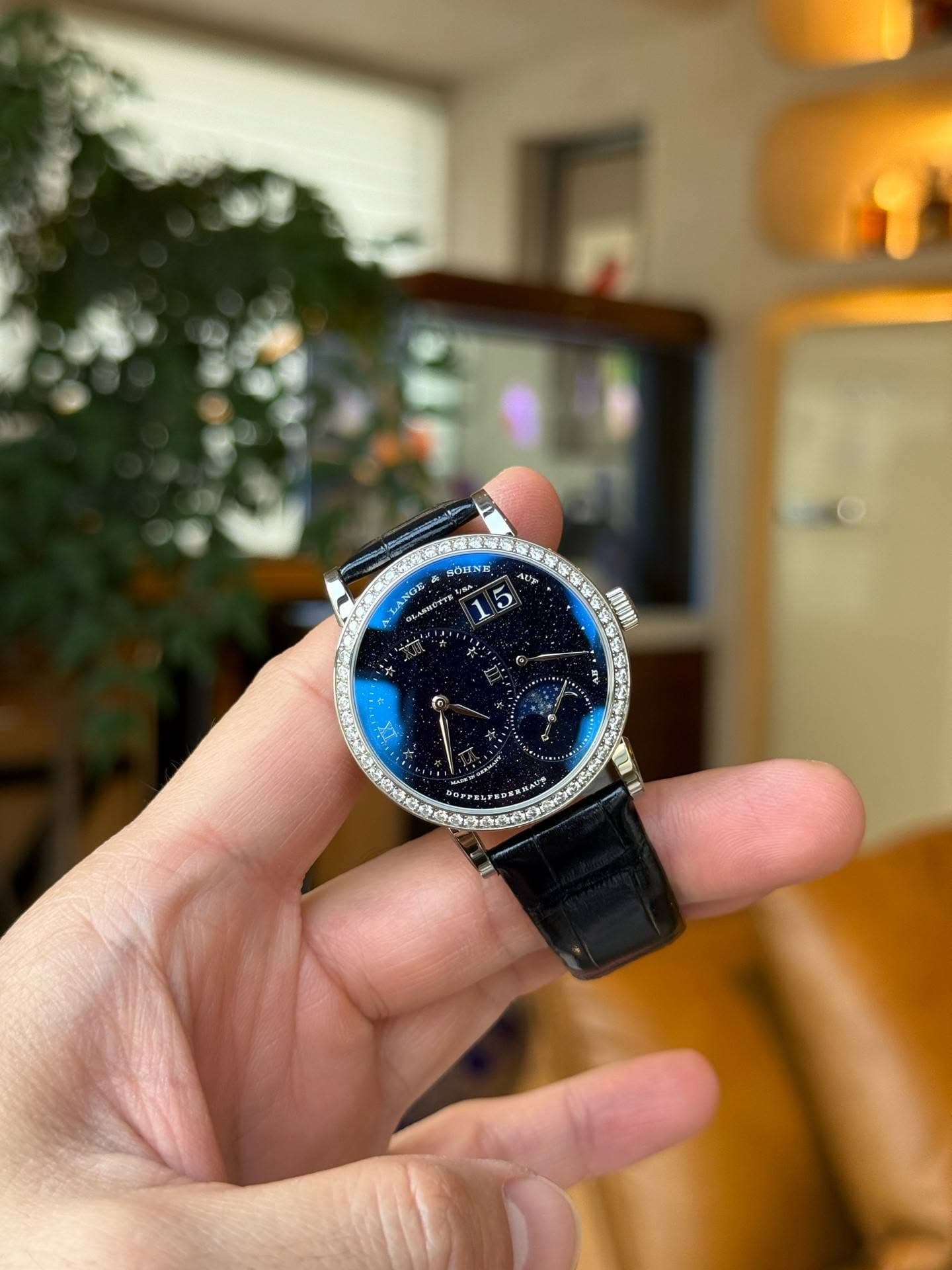 May be an image of wrist watch and text